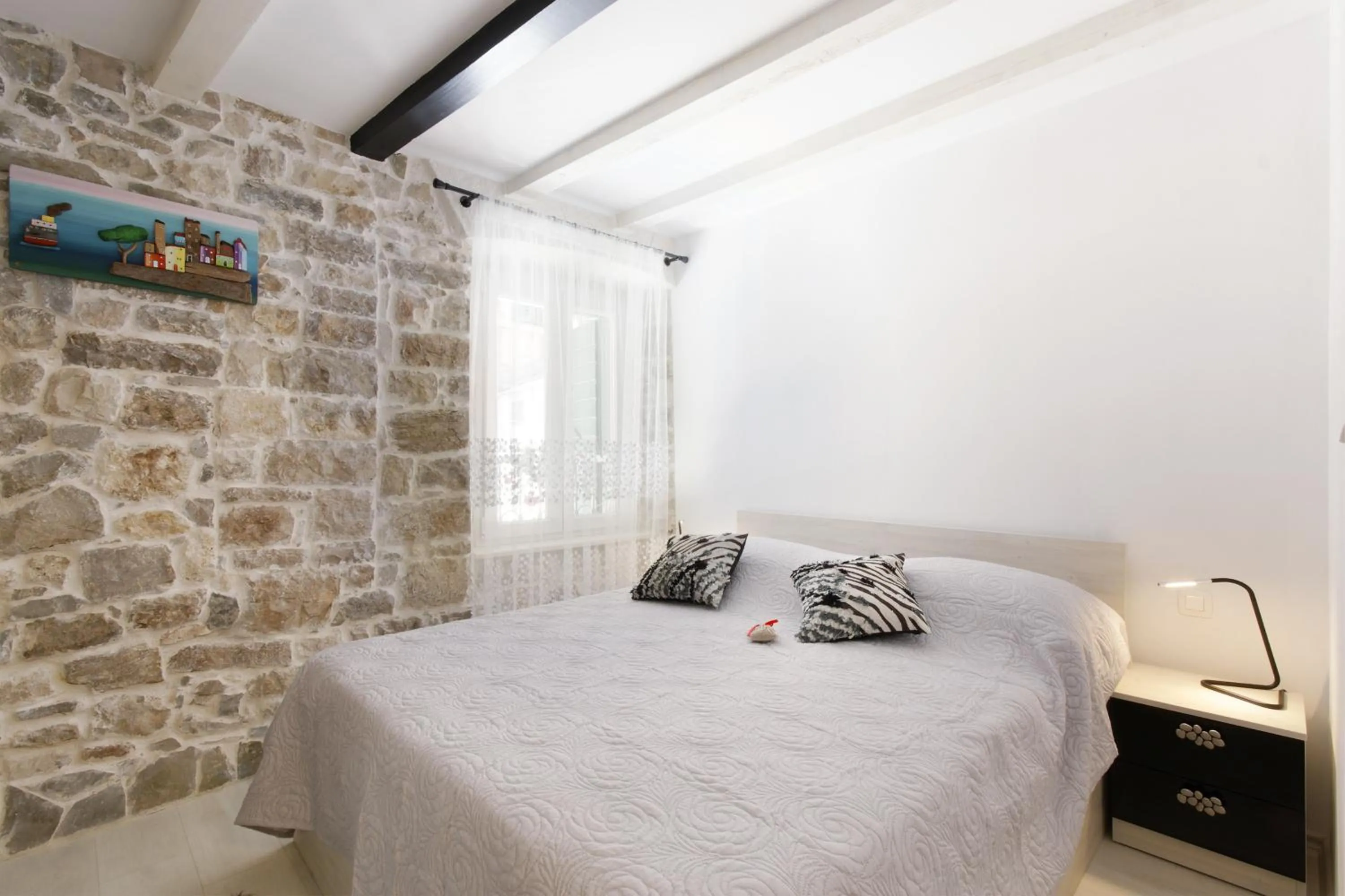 Bed in Apartment Stone