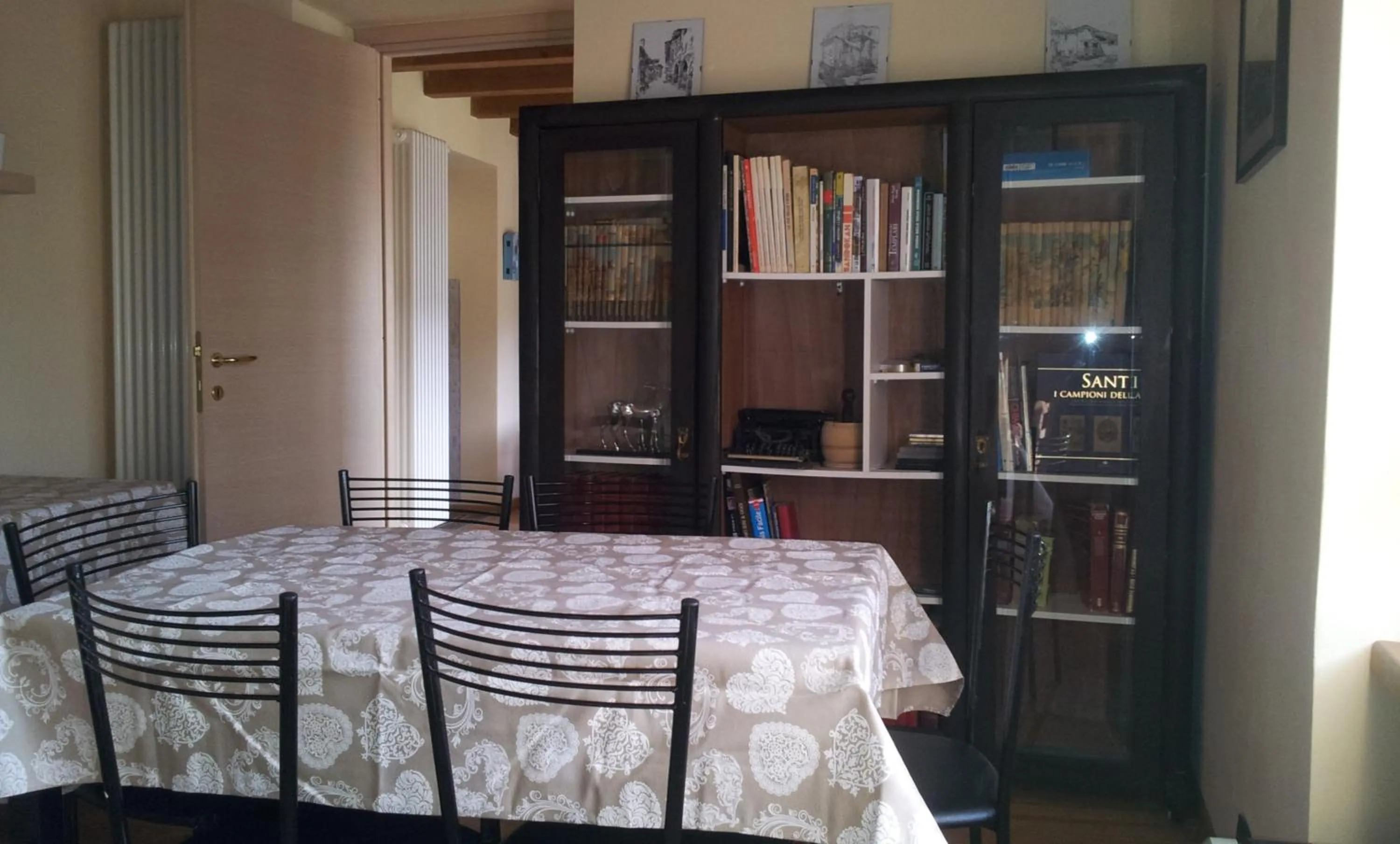 Communal lounge/ TV room in B&B Casa Arcangeli