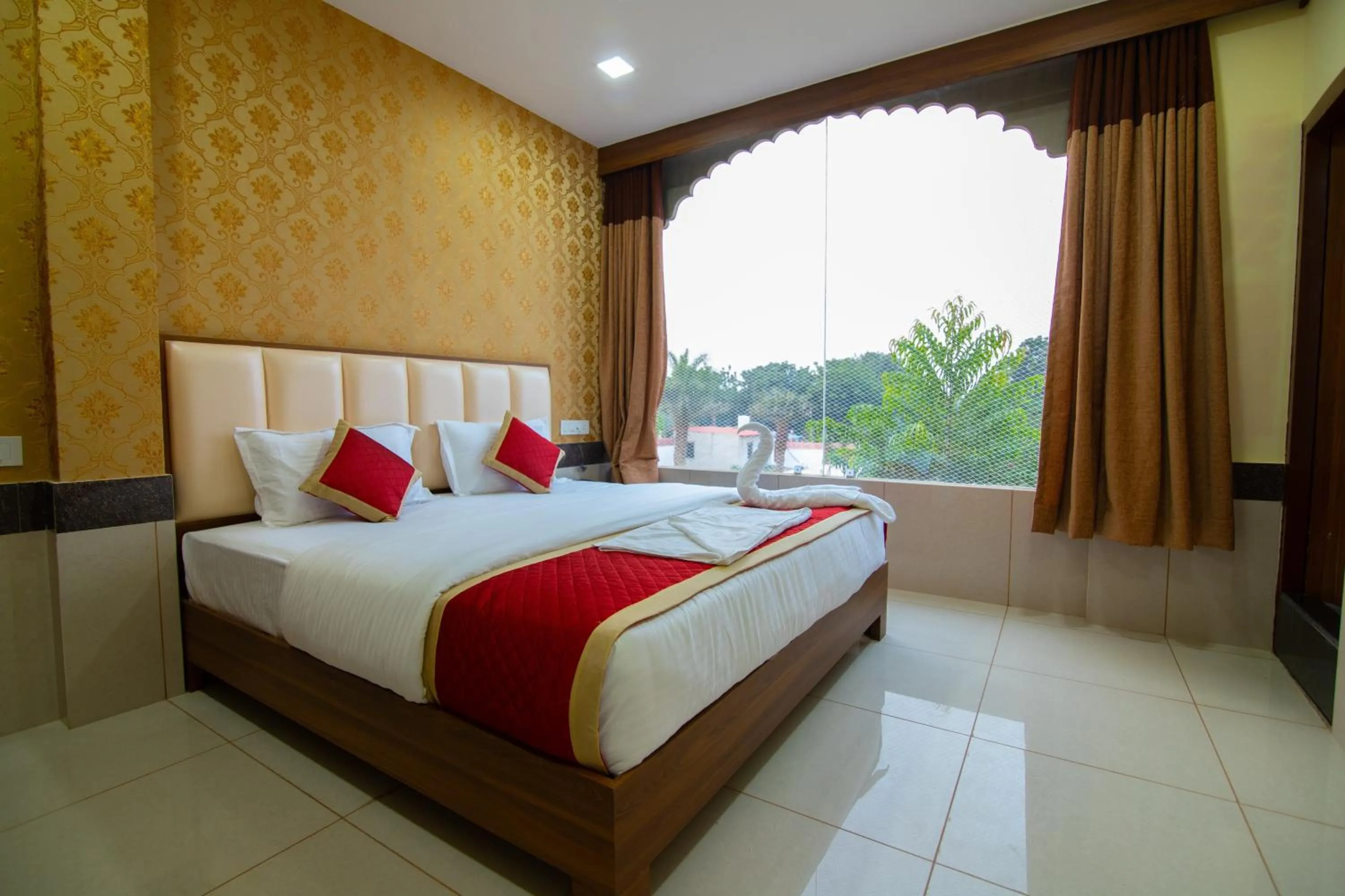 Bed in Deora Resort and Hotel