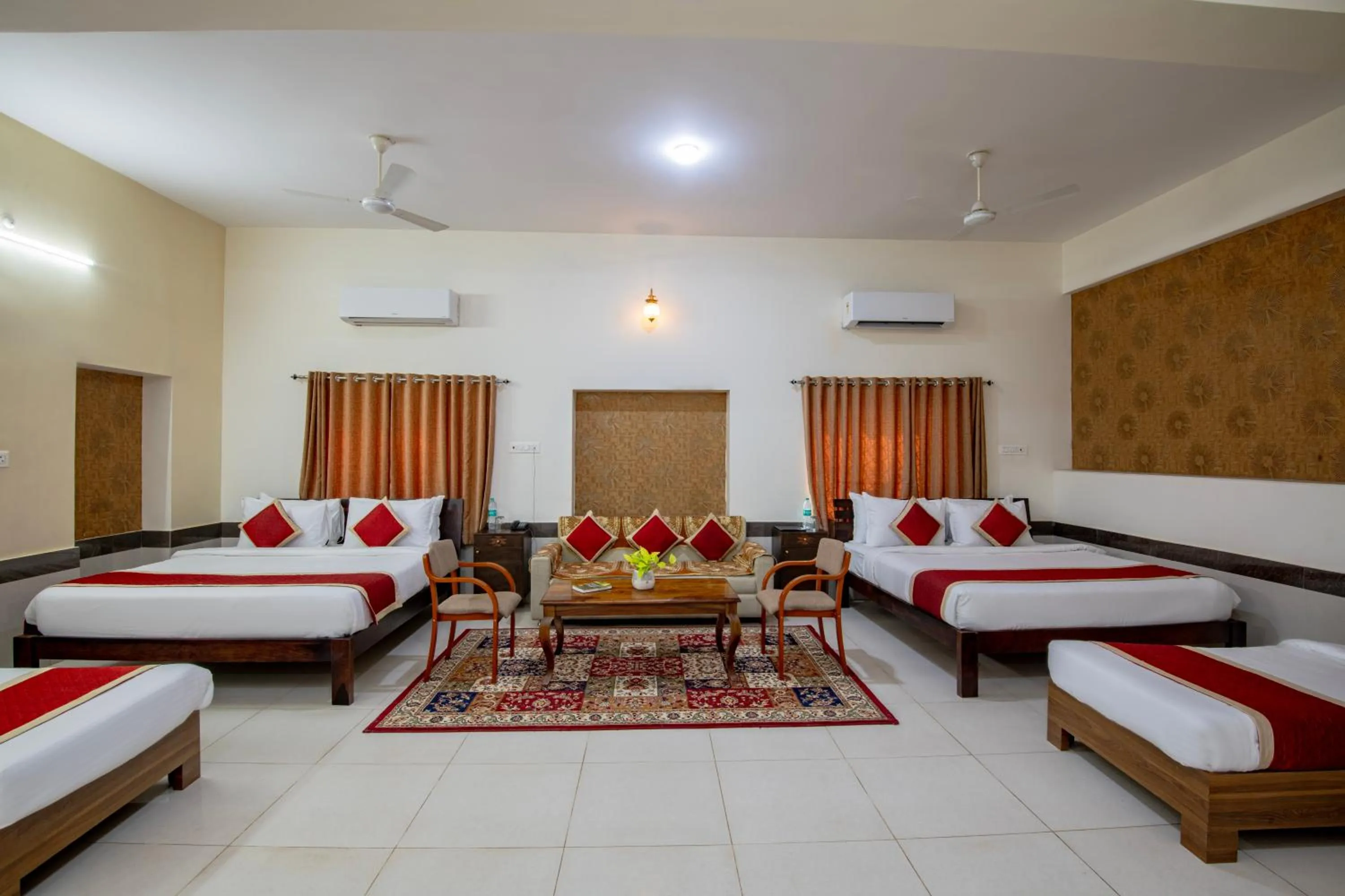 Seating area, Bed in Deora Resort and Hotel