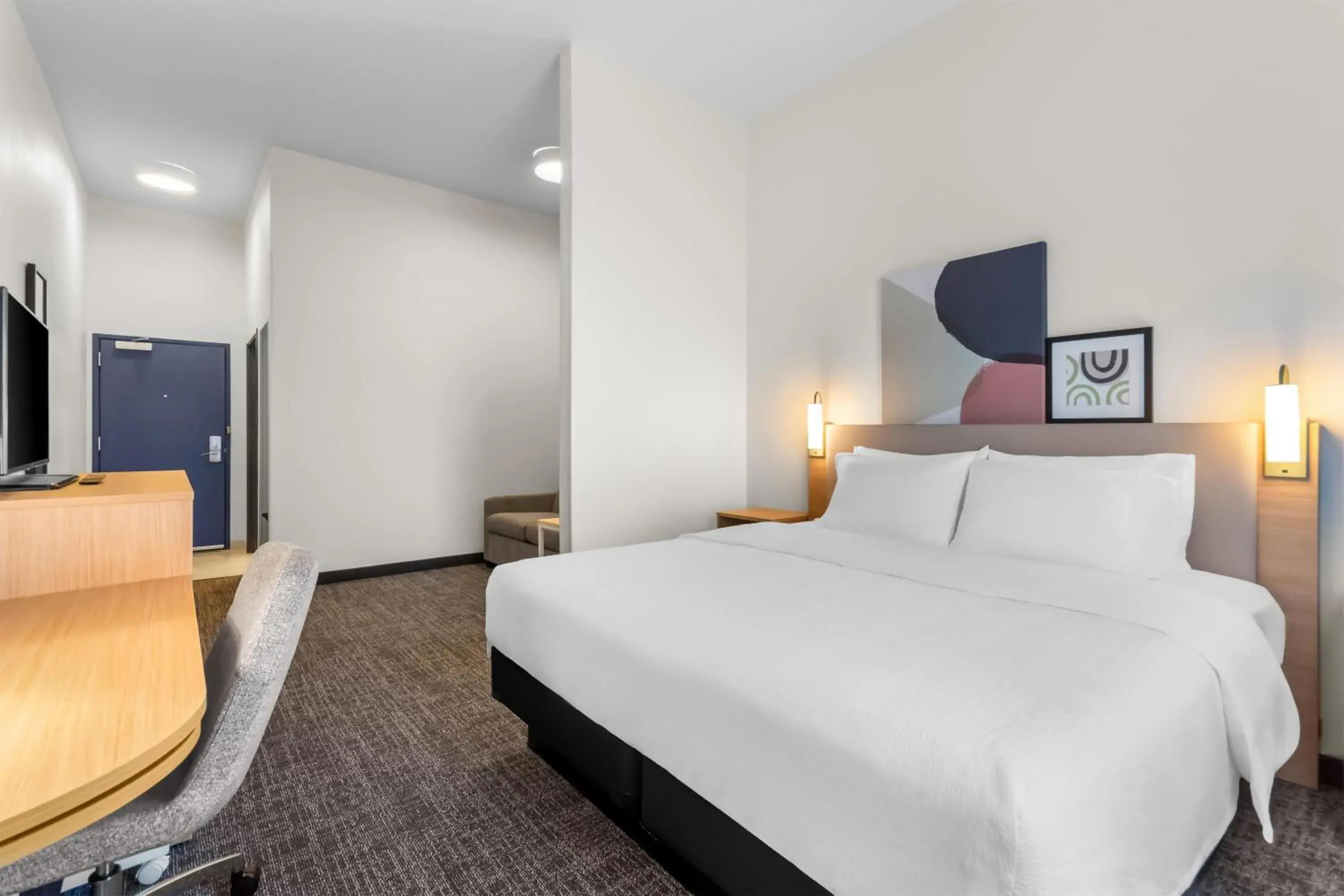 Living room, Bed in Spark by Hilton Dothan Living room, Bed in Spark by Hilton Dothan