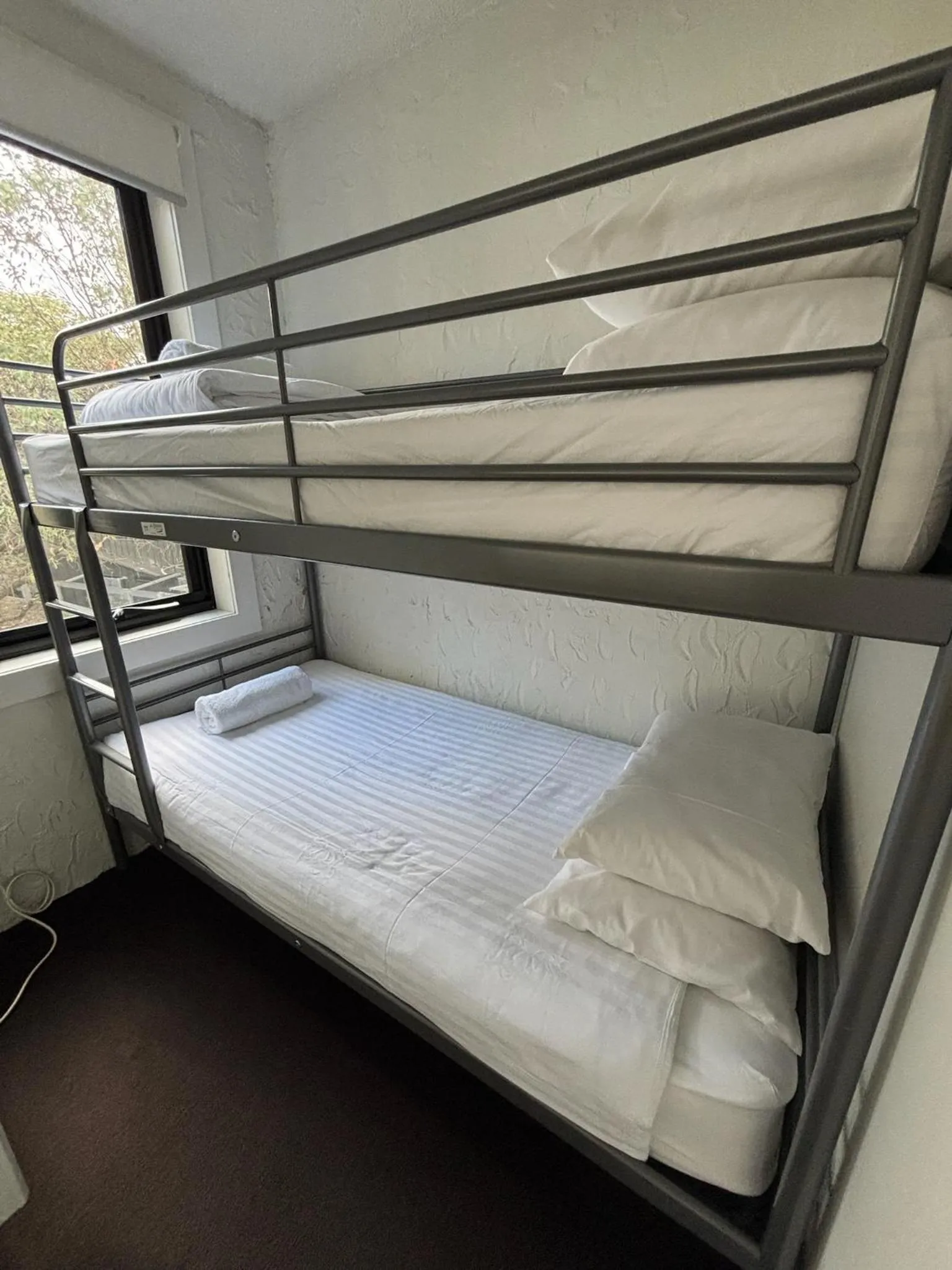 Bed in Silverski Rooms and Apartments