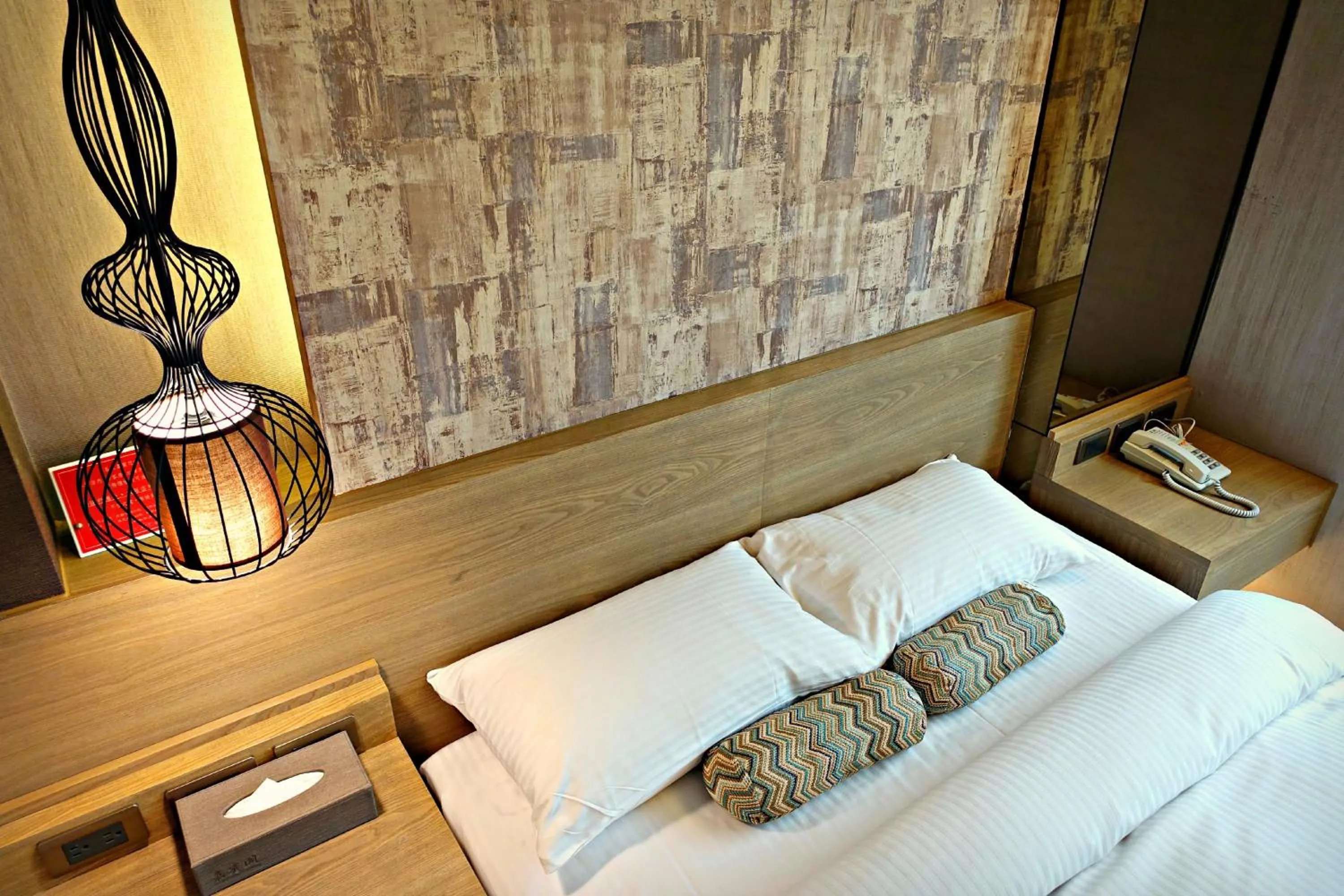 Bed in JBG Hotspring Resort Hotel