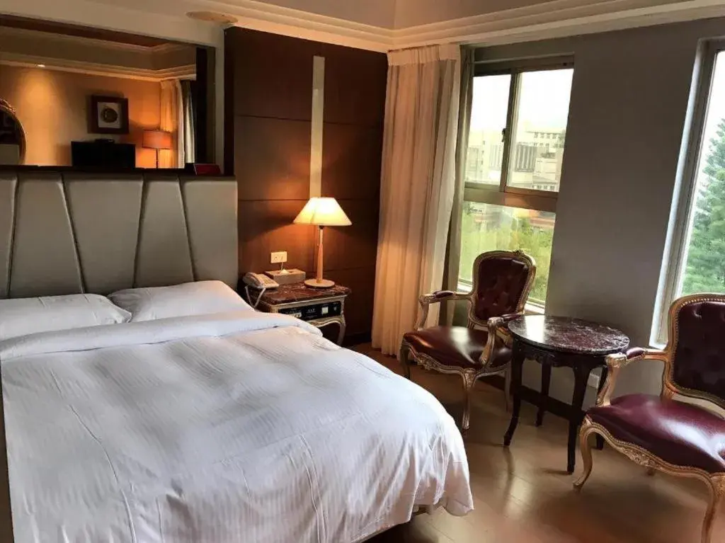 Bed in JBG Hotspring Resort Hotel Bed in JBG Hotspring Resort Hotel