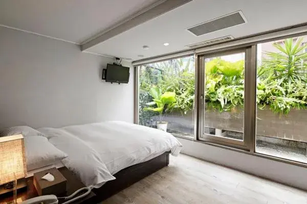 Bed in JBG Hotspring Resort Hotel Bed in JBG Hotspring Resort Hotel