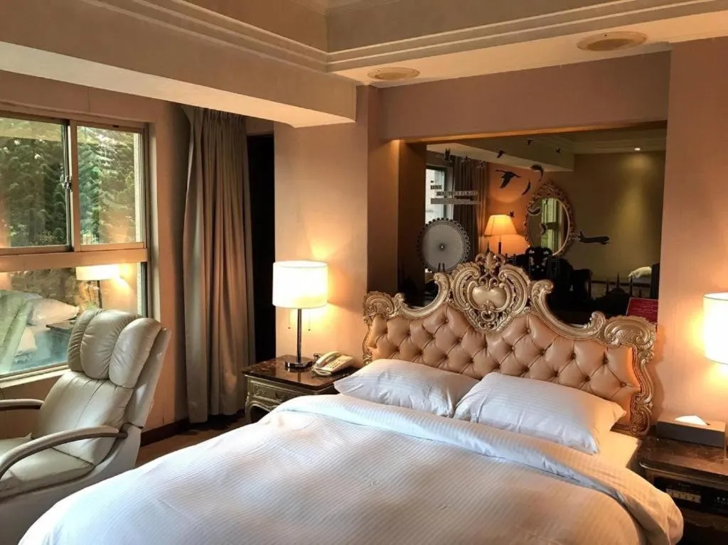 Bed in JBG Hotspring Resort Hotel