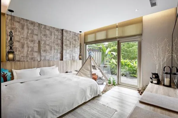 Bed in JBG Hotspring Resort Hotel