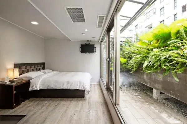 Bed in JBG Hotspring Resort Hotel Bed in JBG Hotspring Resort Hotel