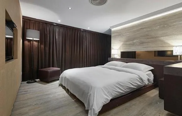 Bed in JBG Hotspring Resort Hotel