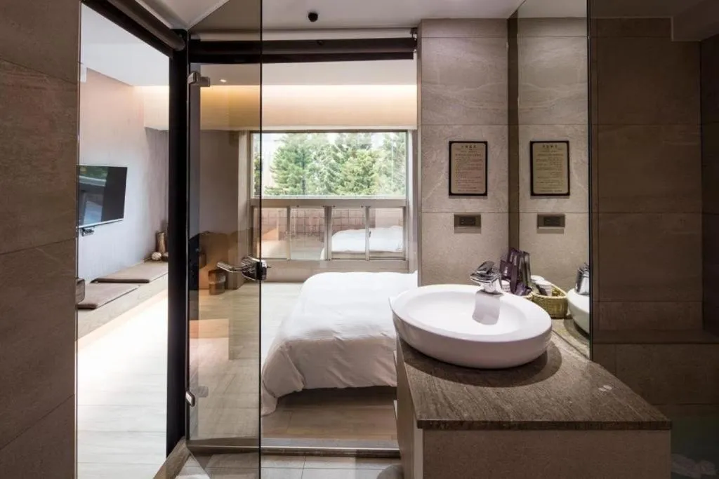 Bed in JBG Hotspring Resort Hotel