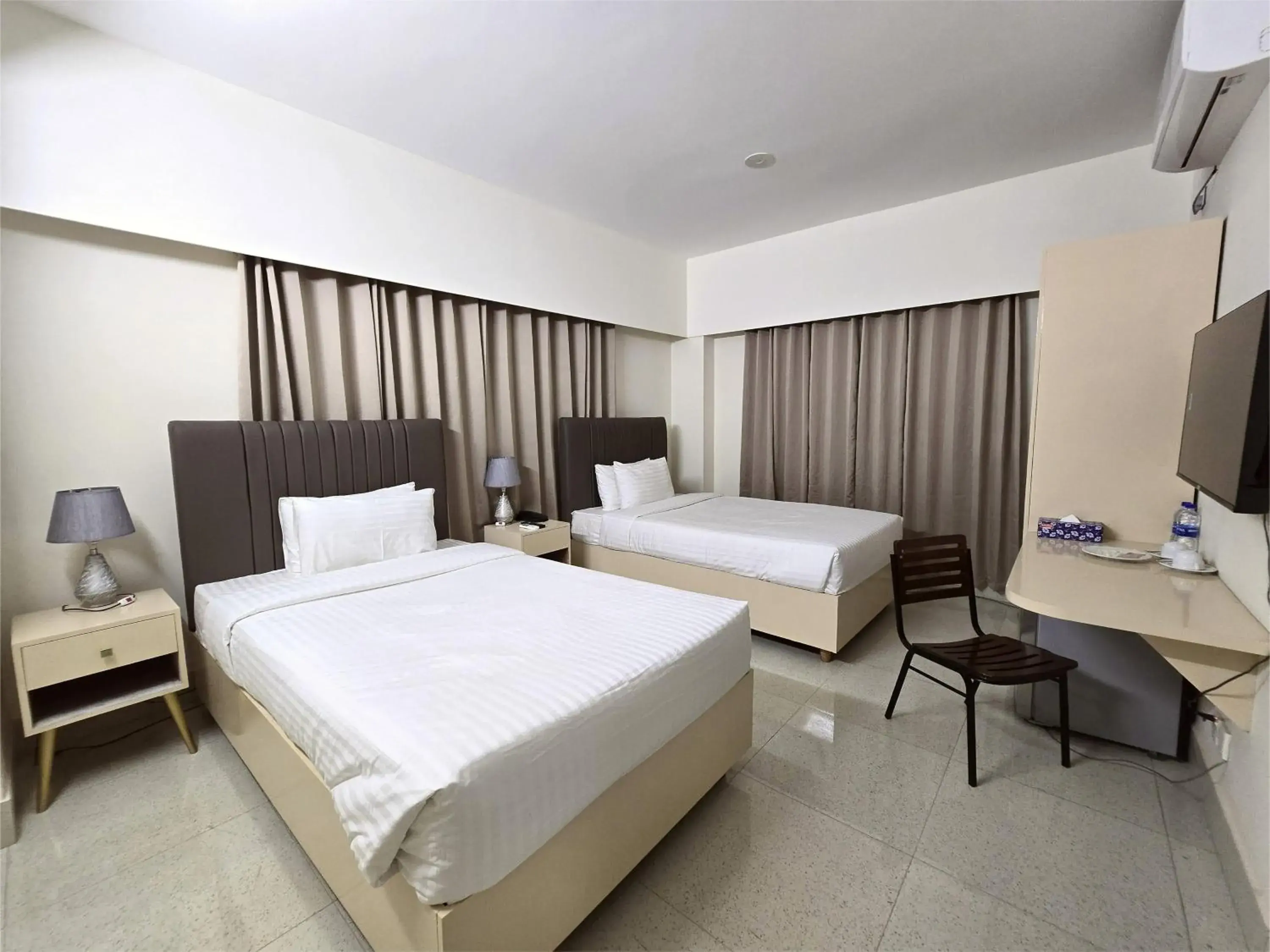 Photo of the whole room, Bed in Royal Regent Suites Dhaka Photo of the whole room, Bed in Royal Regent Suites Dhaka