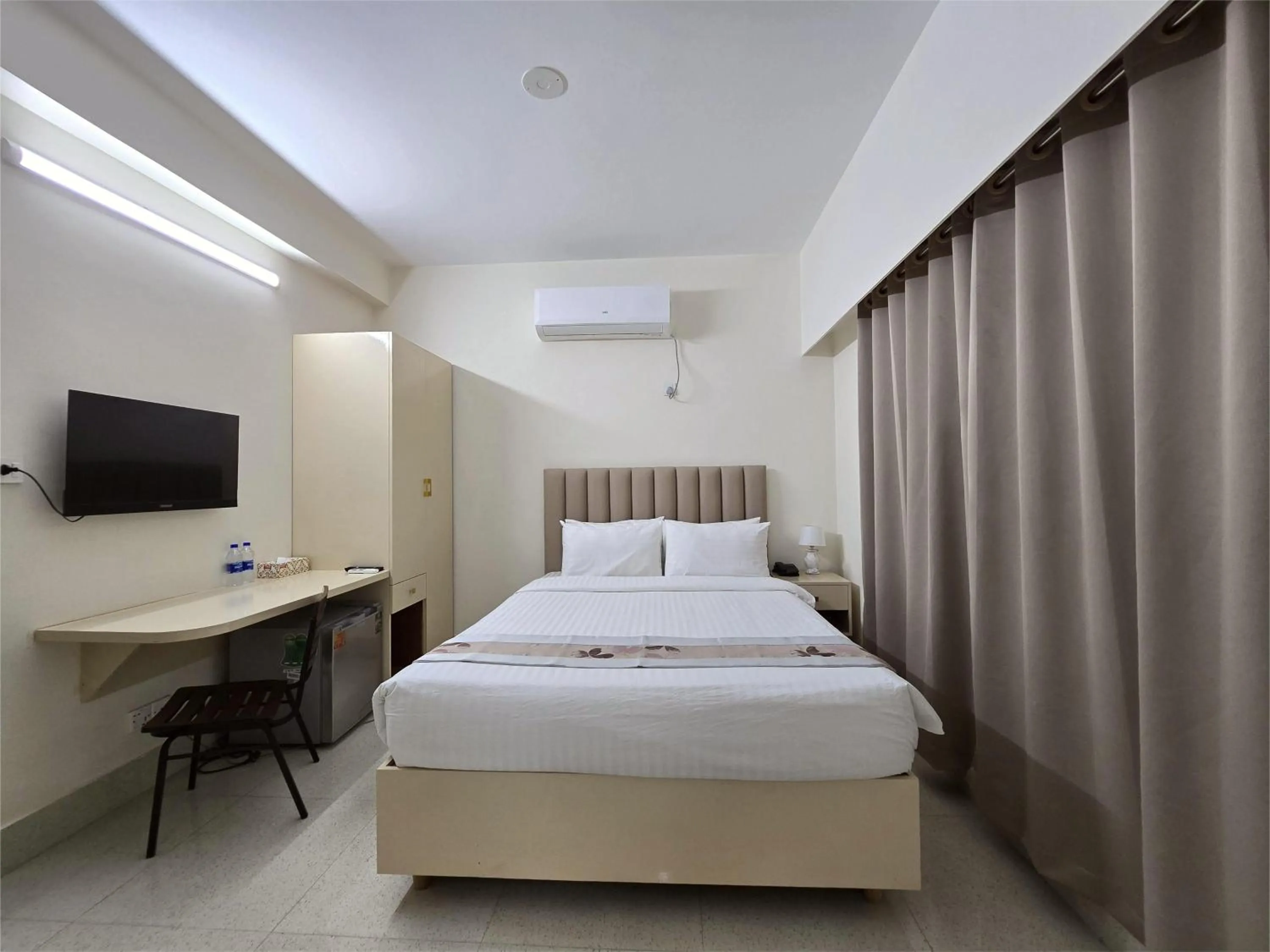 Photo of the whole room, Bed in Royal Regent Suites Dhaka