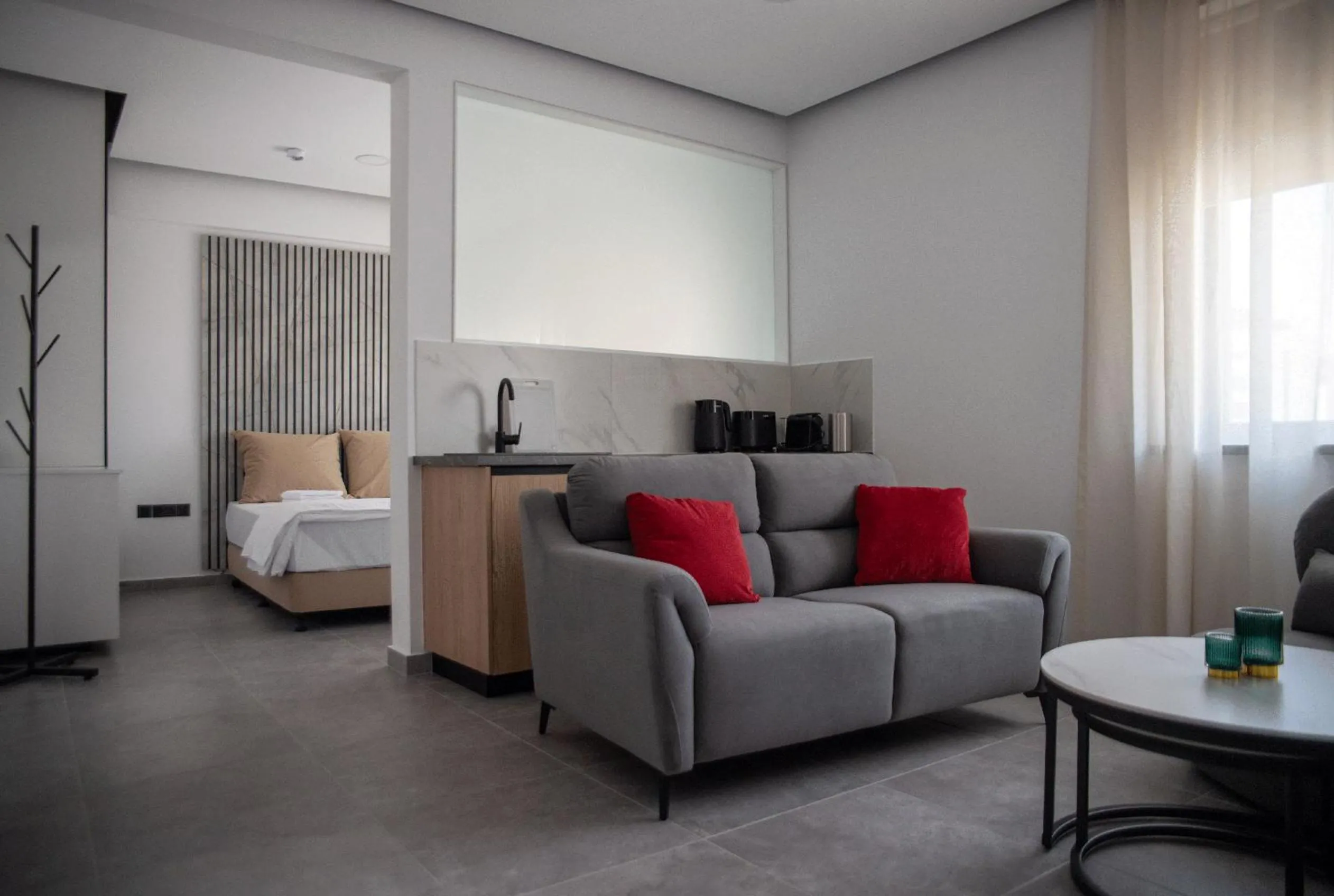 Seating area, Bed in Le Bouquet Luxury Suites Ltd