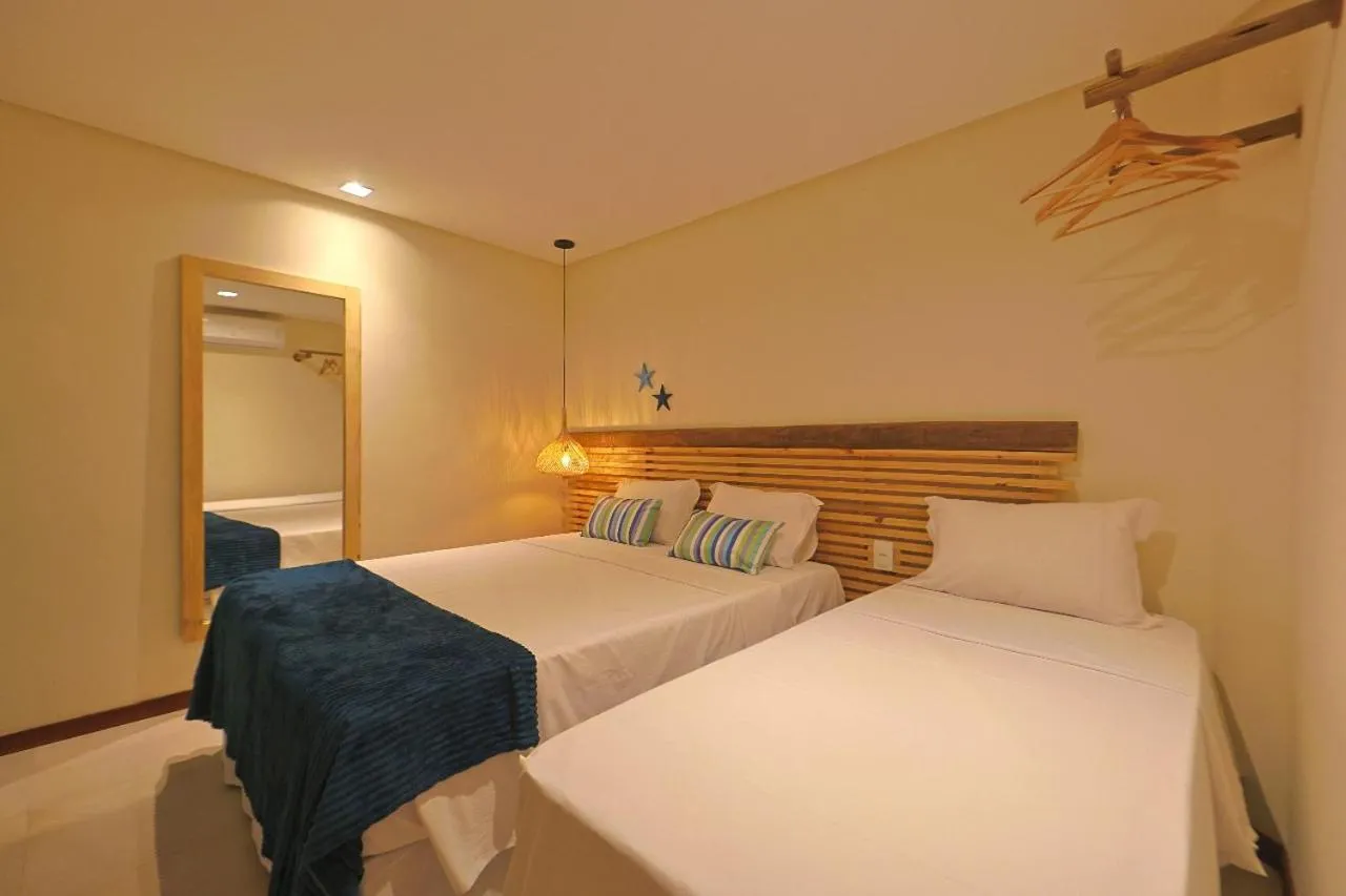 Bed in Casa Manoa Pousada