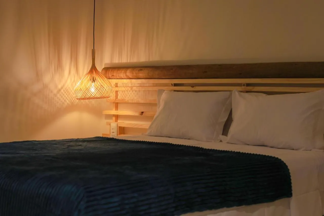 Bed in Casa Manoa Pousada