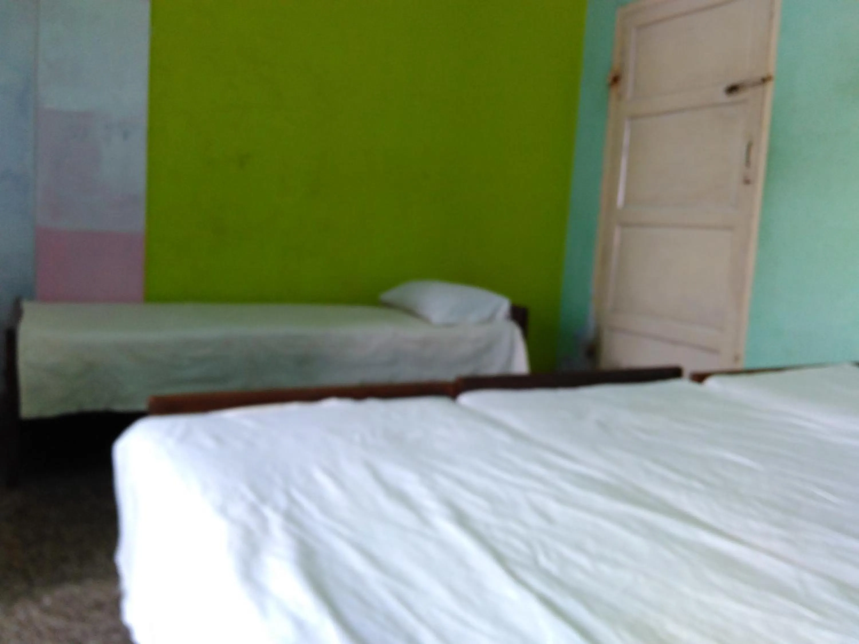 Bed in Hotel Ganesh Lodge