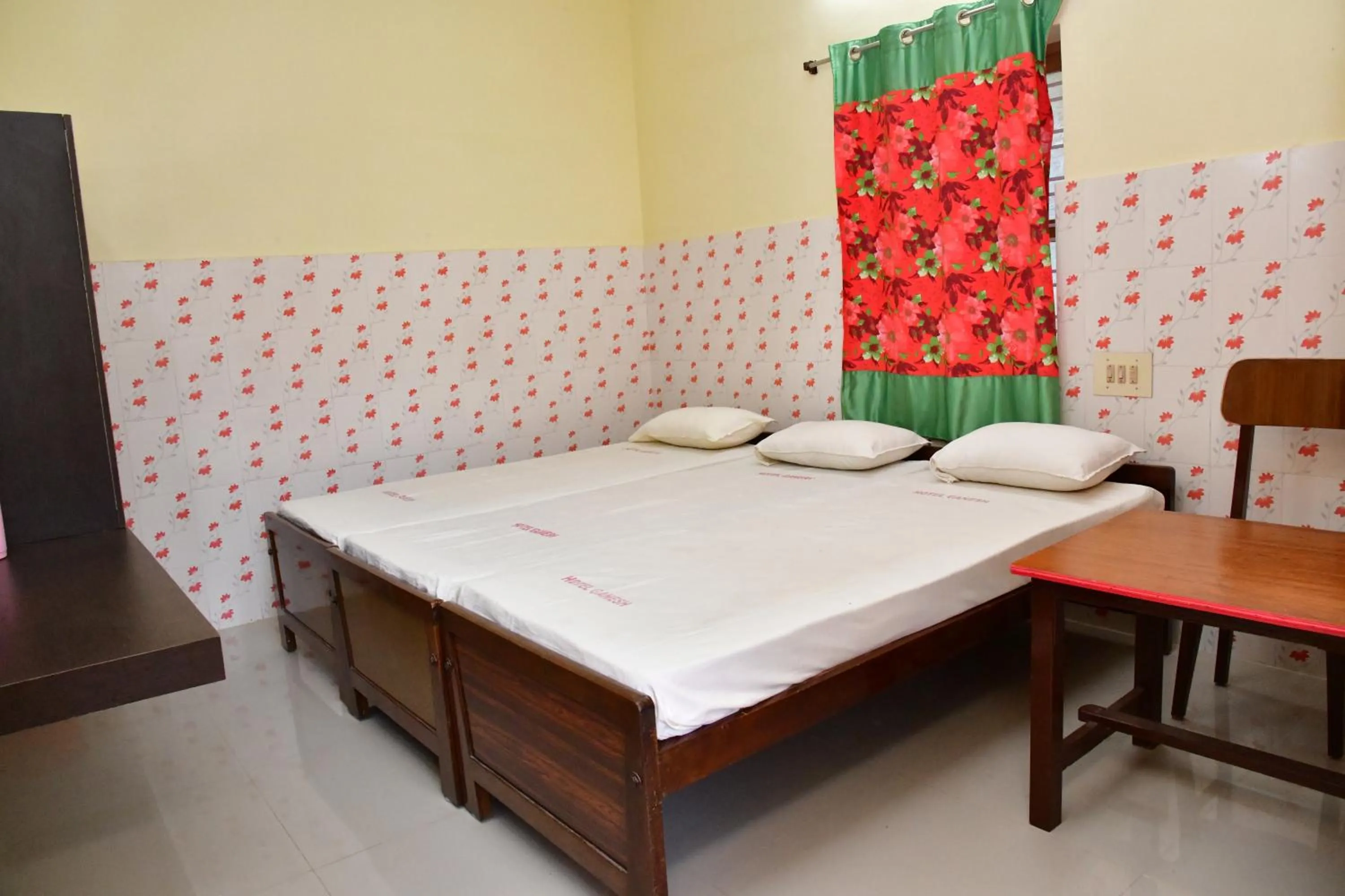 Bed in Hotel Ganesh Lodge