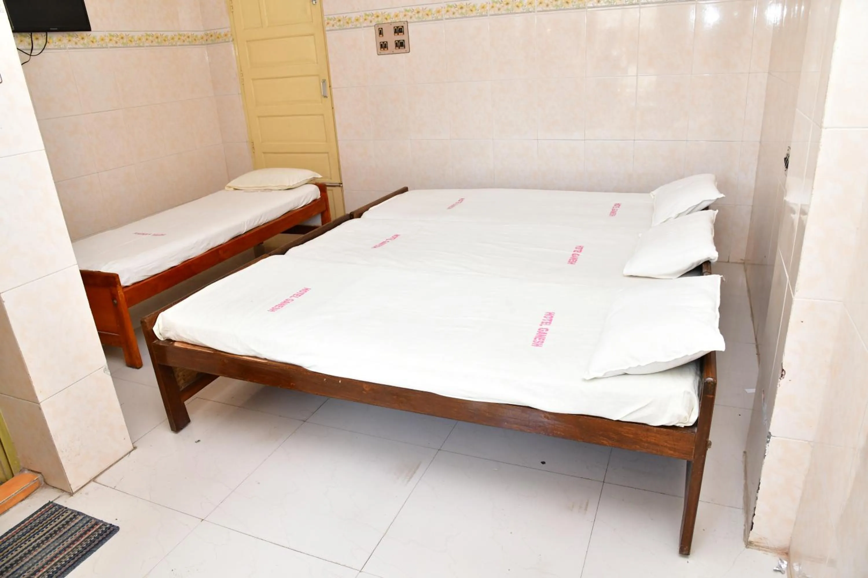 Bed in Hotel Ganesh Lodge