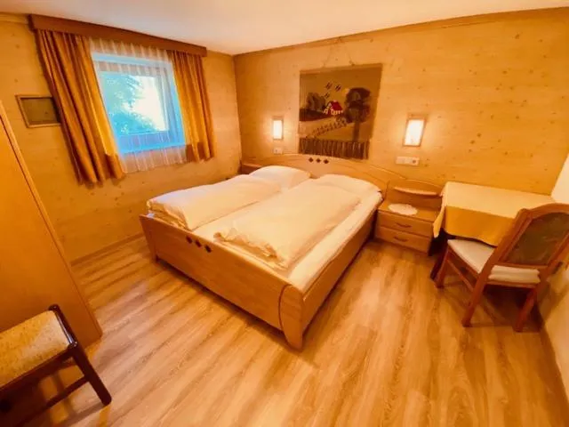 Bed in Apartments Residence Montana