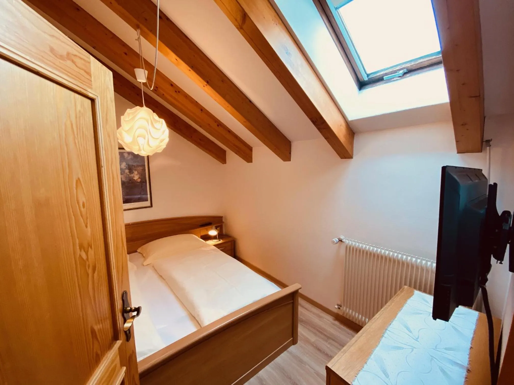 Bed in Apartments Residence Montana