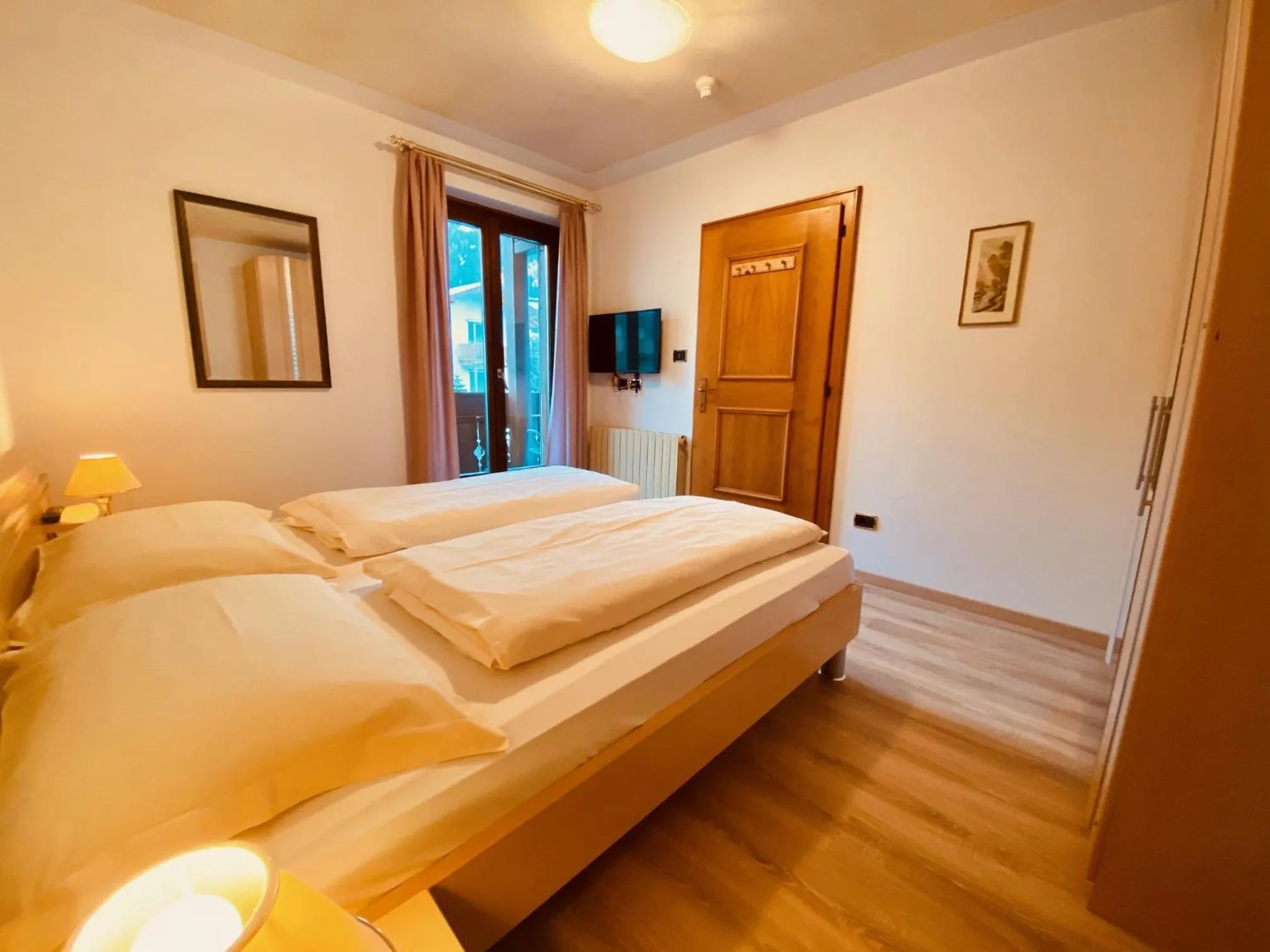 Bed in Apartments Residence Montana