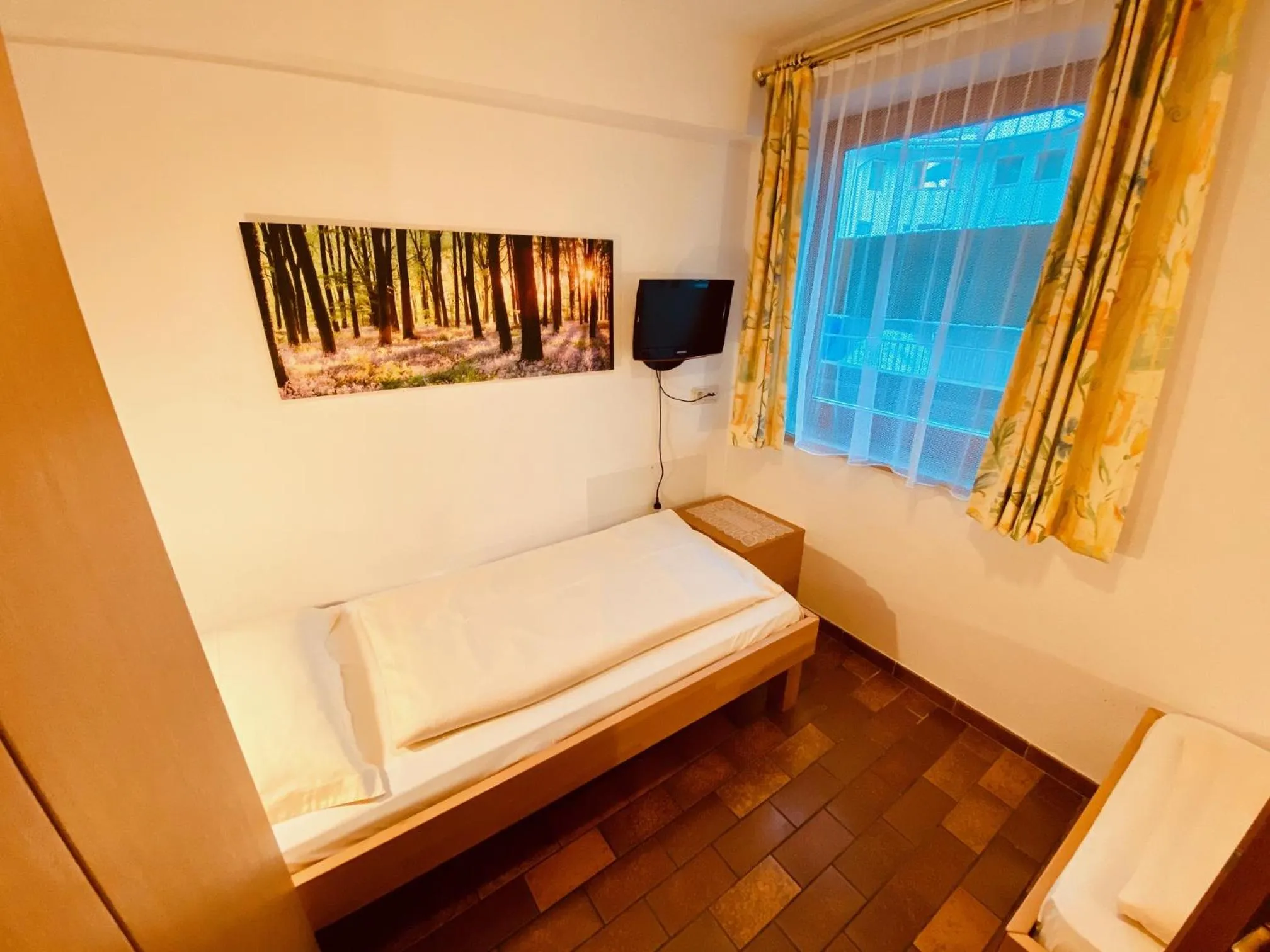 Bed in Apartments Residence Montana