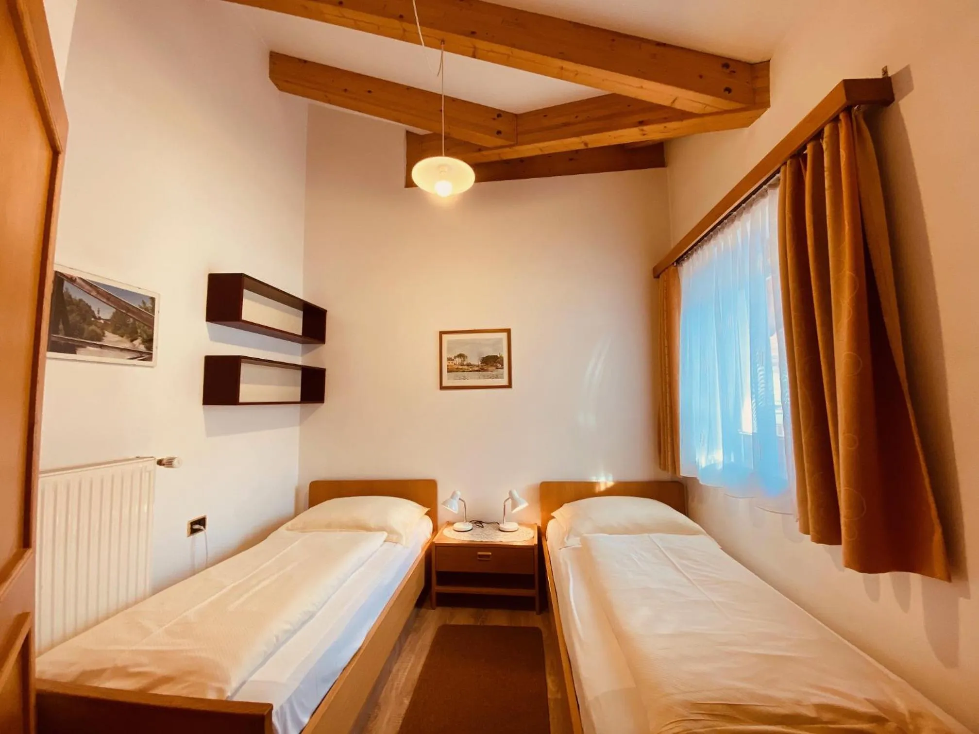 Bed in Apartments Residence Montana