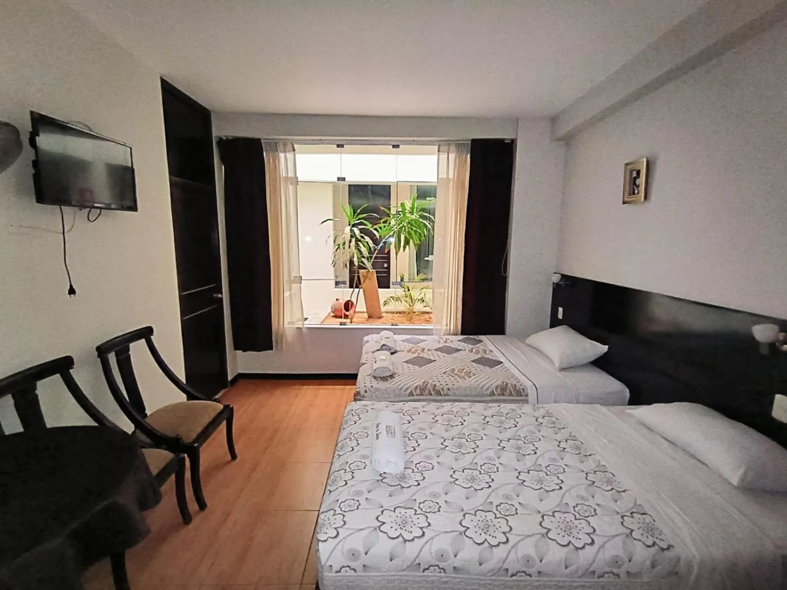 Bed in La Lisera Suite Residencial