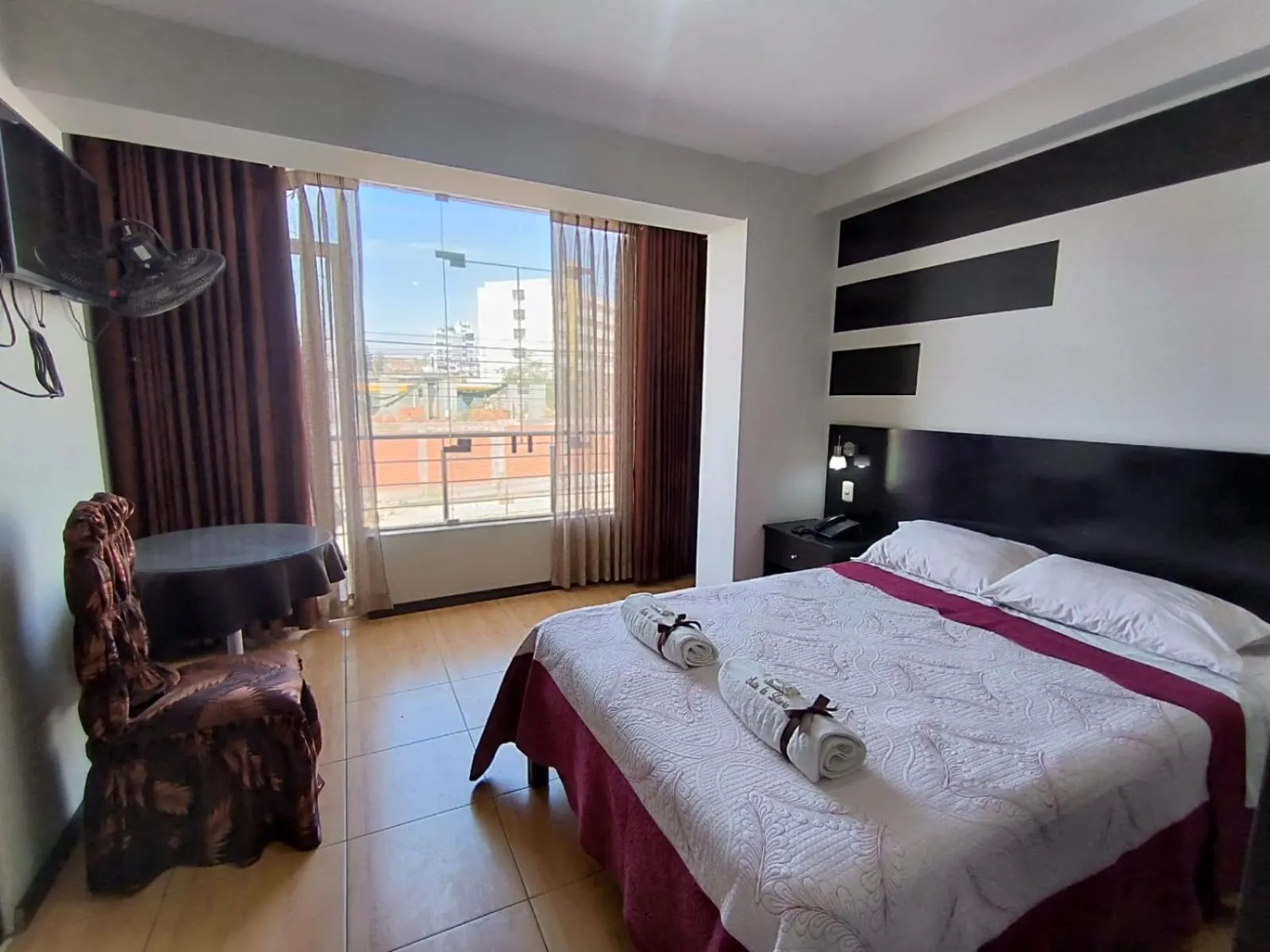 Bed in La Lisera Suite Residencial
