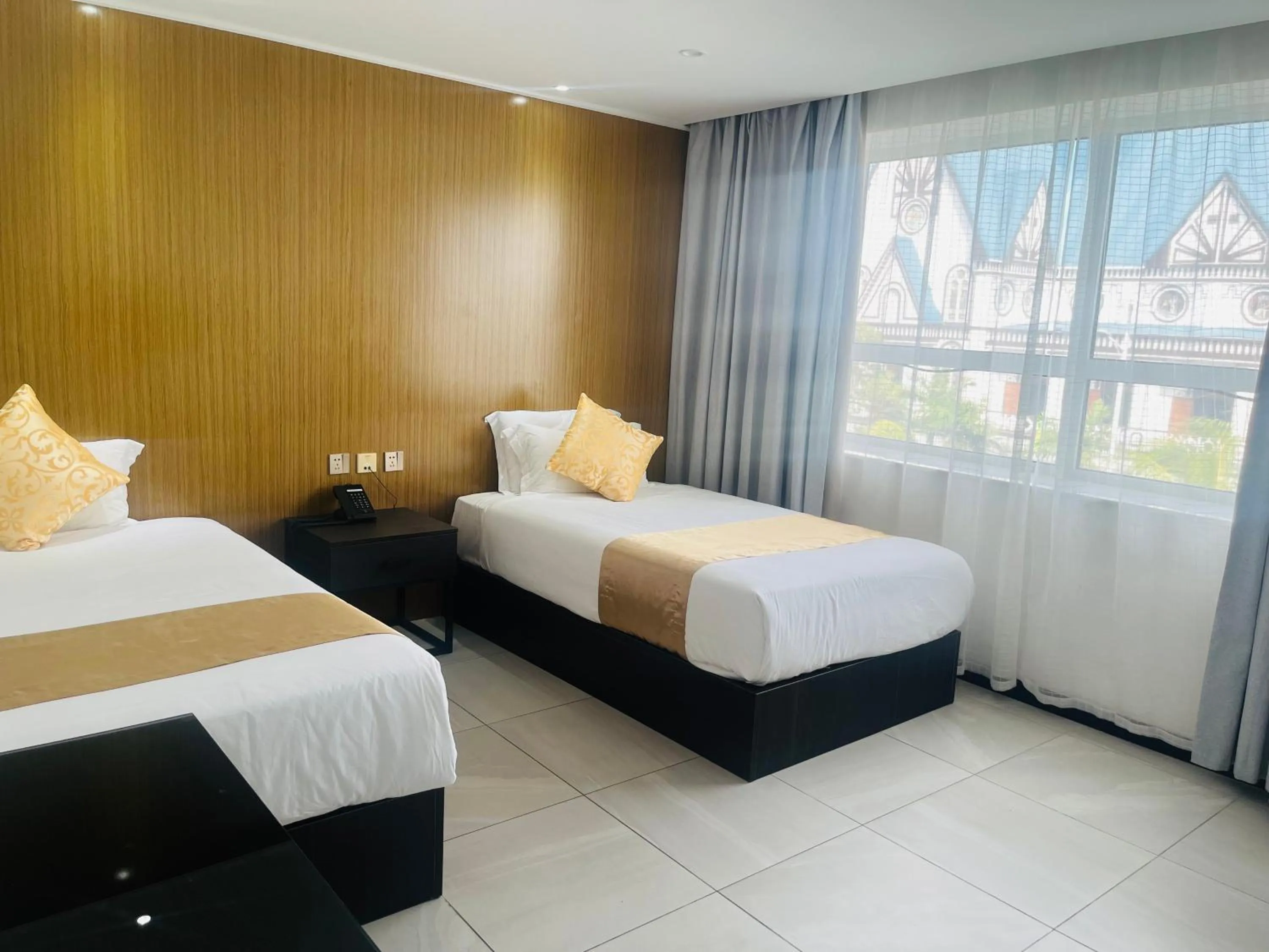 Bed in Tauese Seaview Hotel