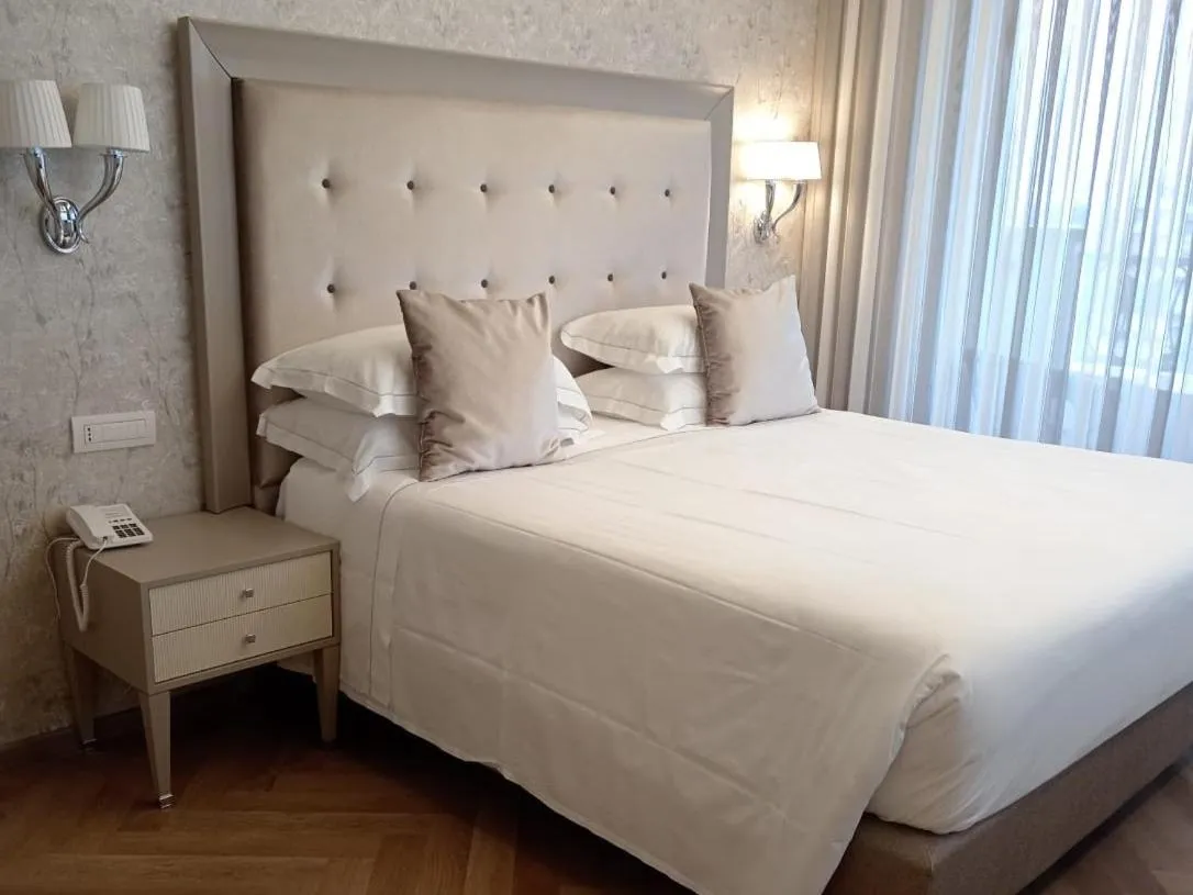 Bed in Grand Hotel Gallia