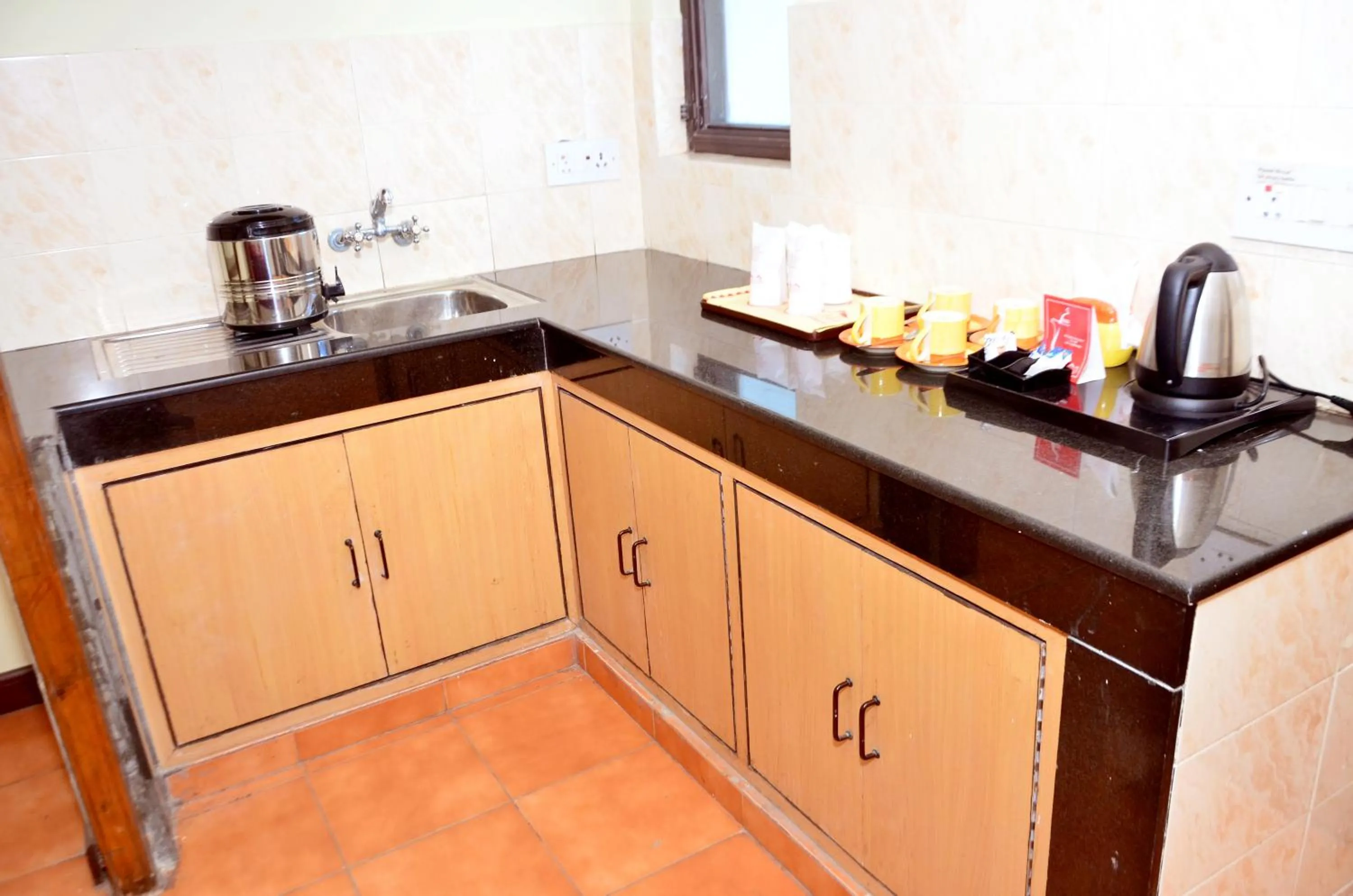 Kitchen or kitchenette in Woodsvilla Resort Ranikhet