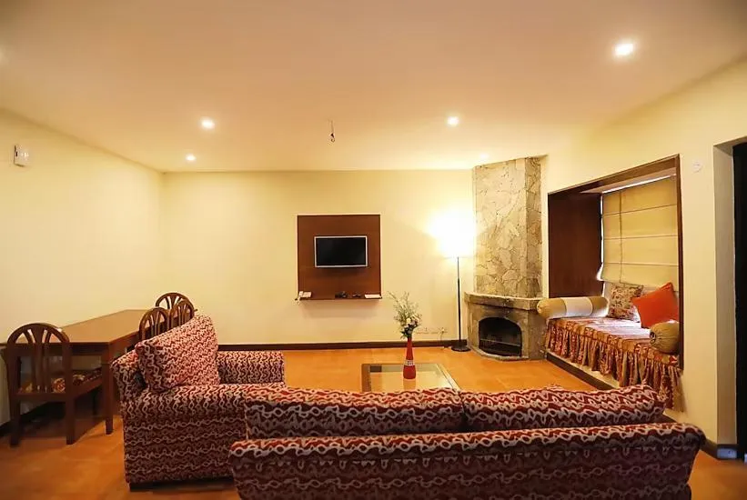 Living room, Bed in Woodsvilla Resort Ranikhet