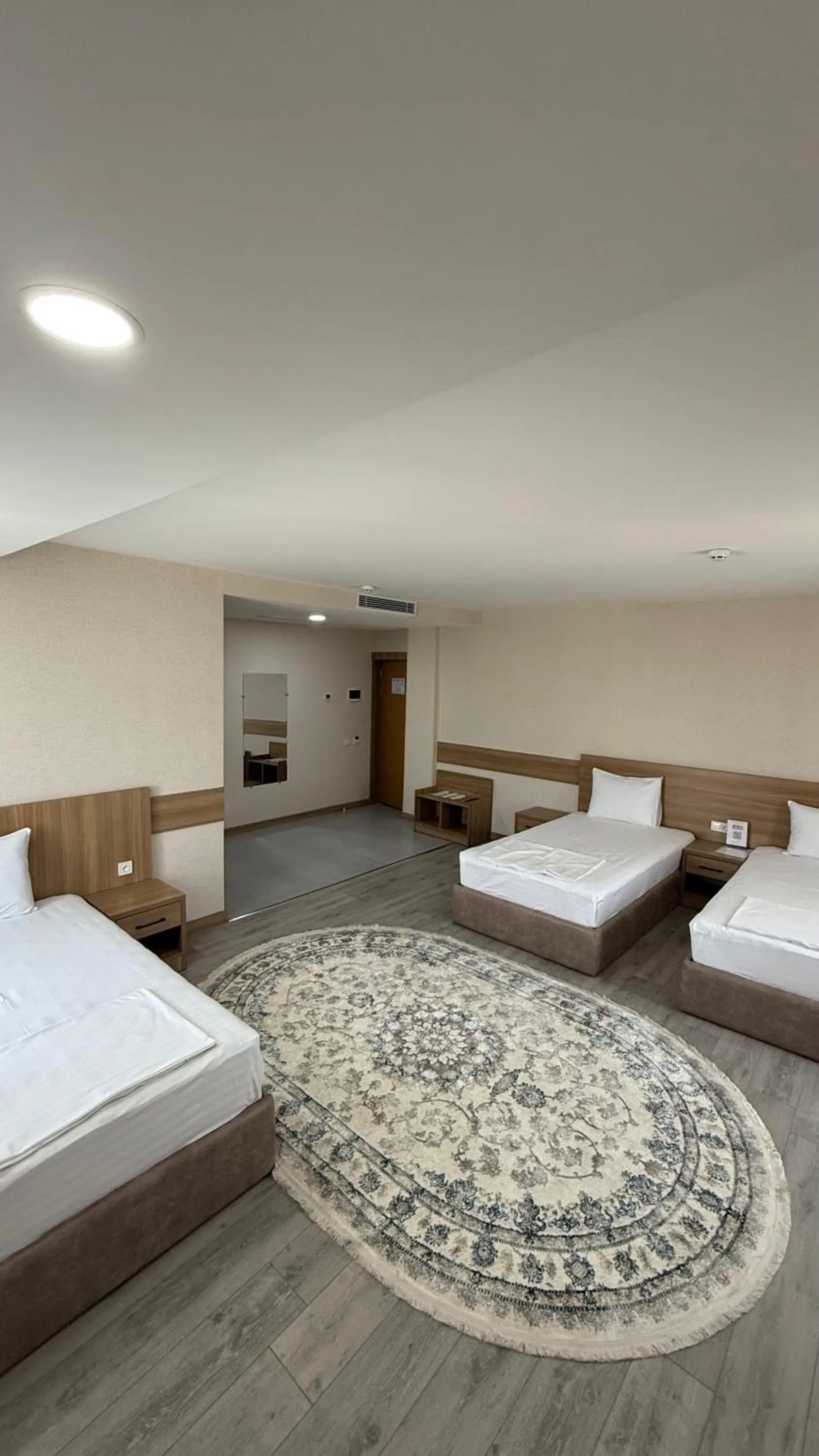 Bed in Saroy Gardens Hotel