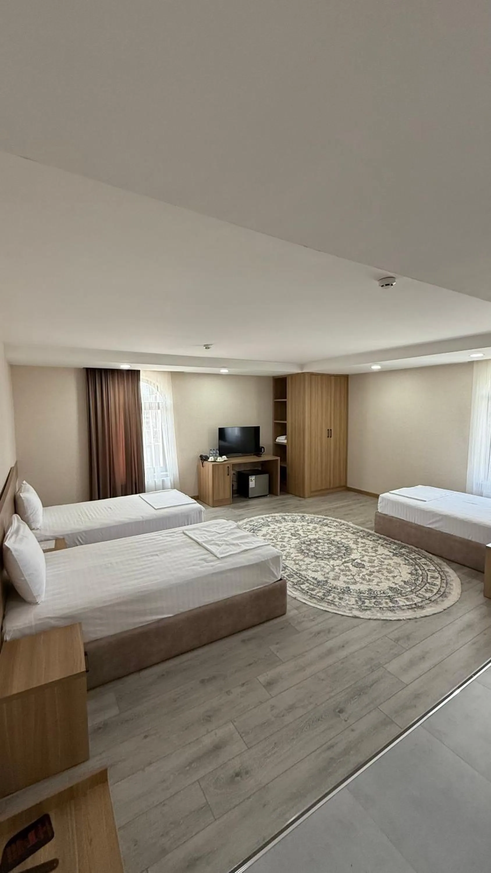 Bed in Saroy Gardens Hotel