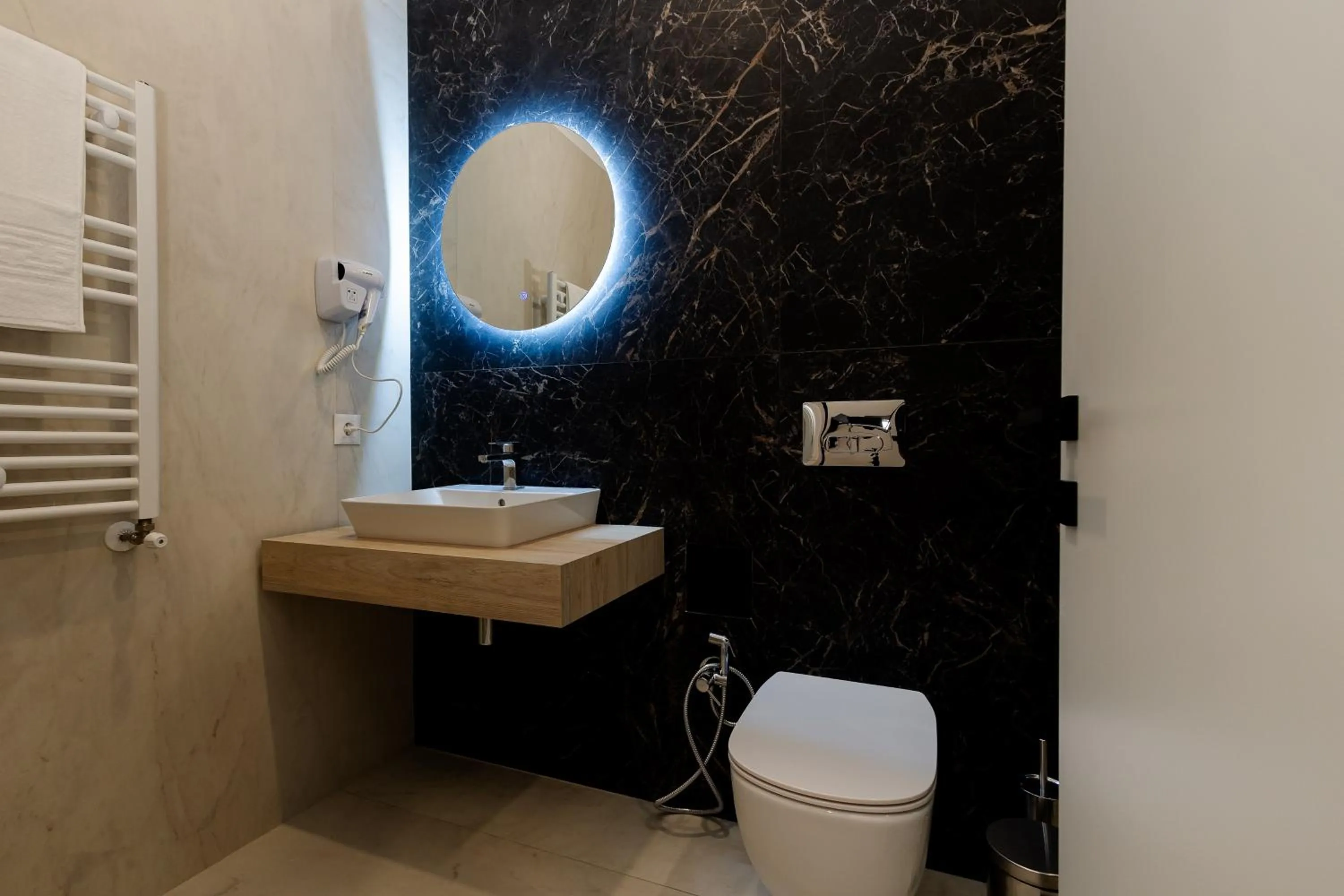 Toilet in Central Suites