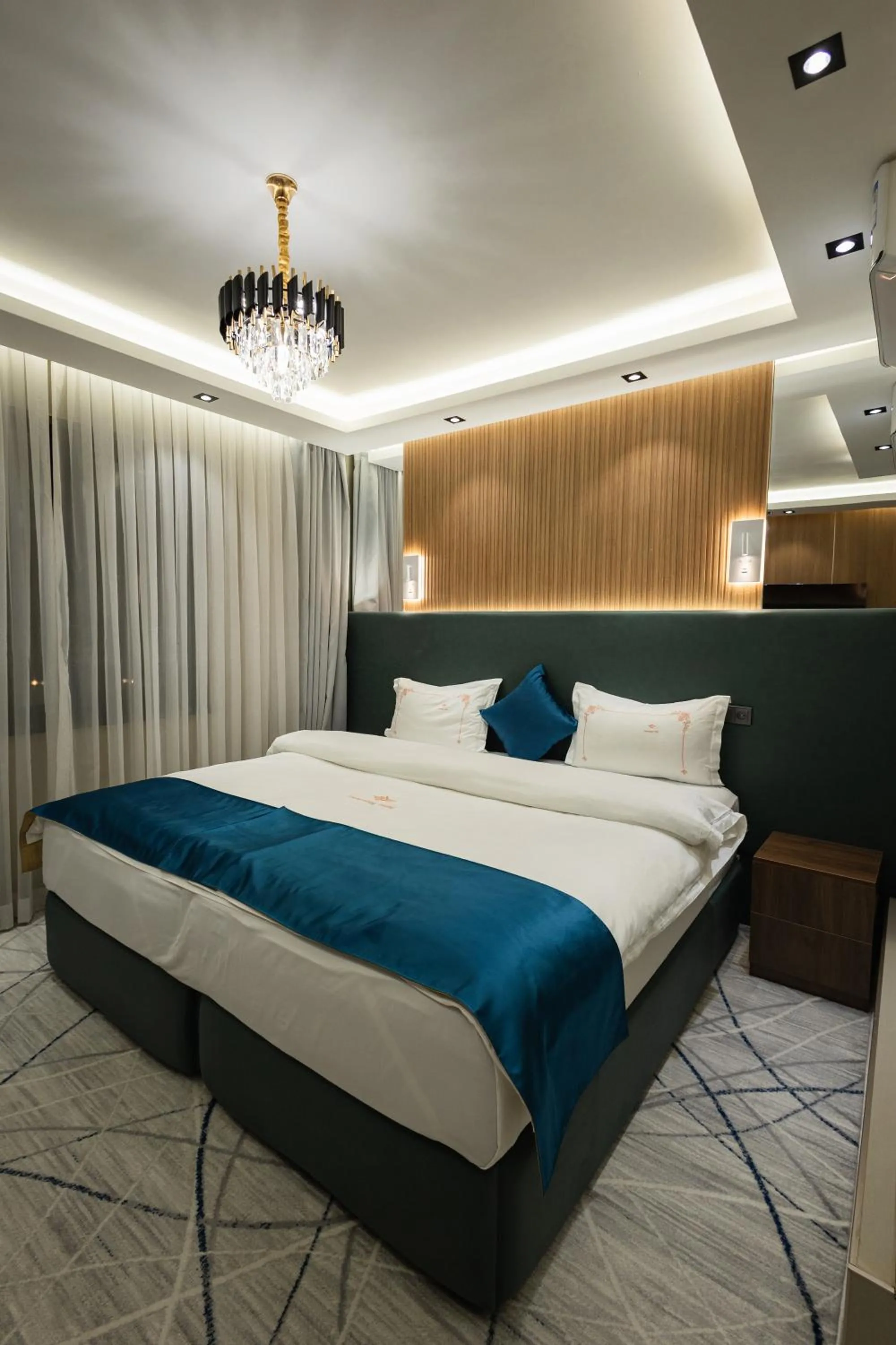Bed in LakeSide Hotel by EDEN Group