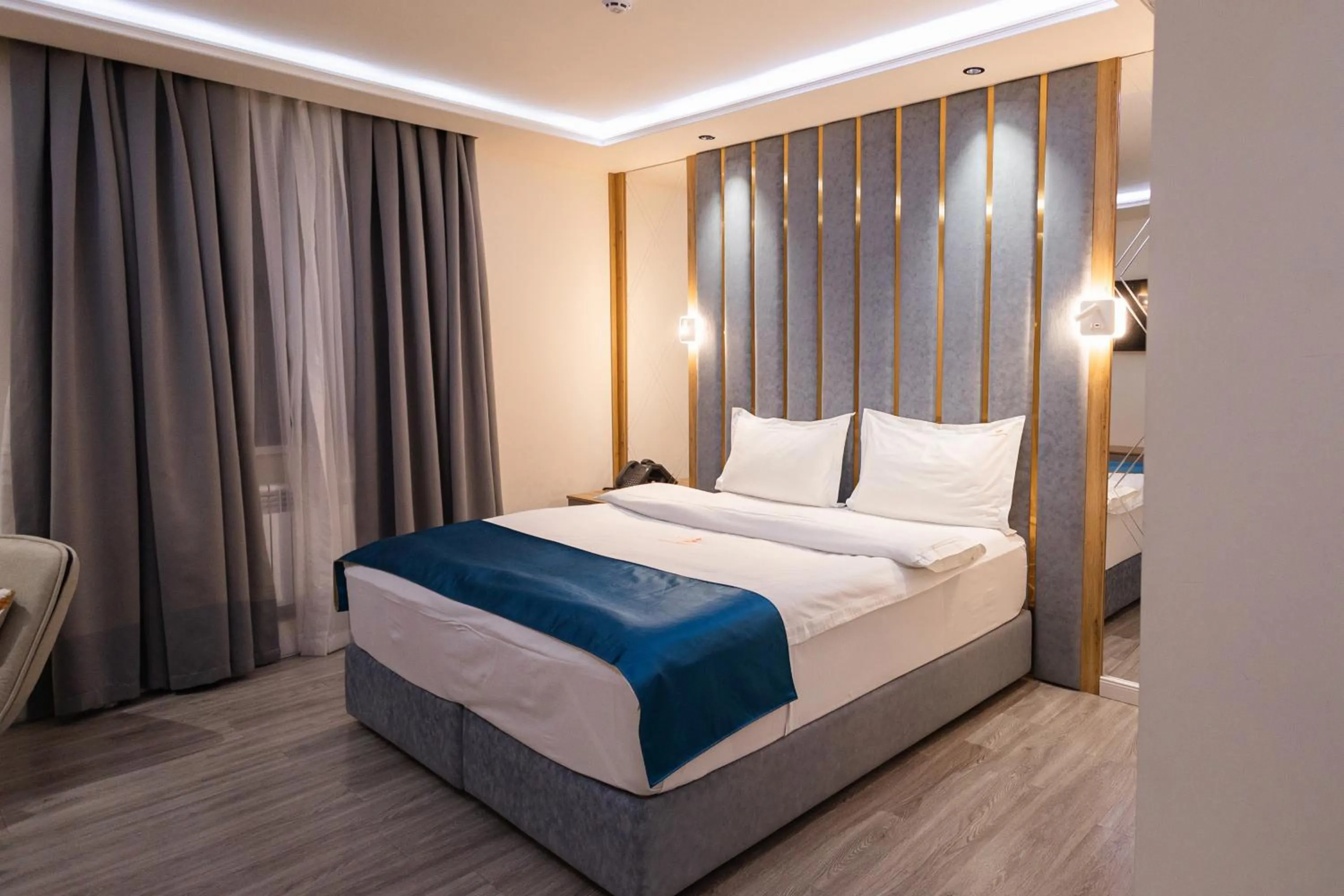 Bed in LakeSide Hotel by EDEN Group