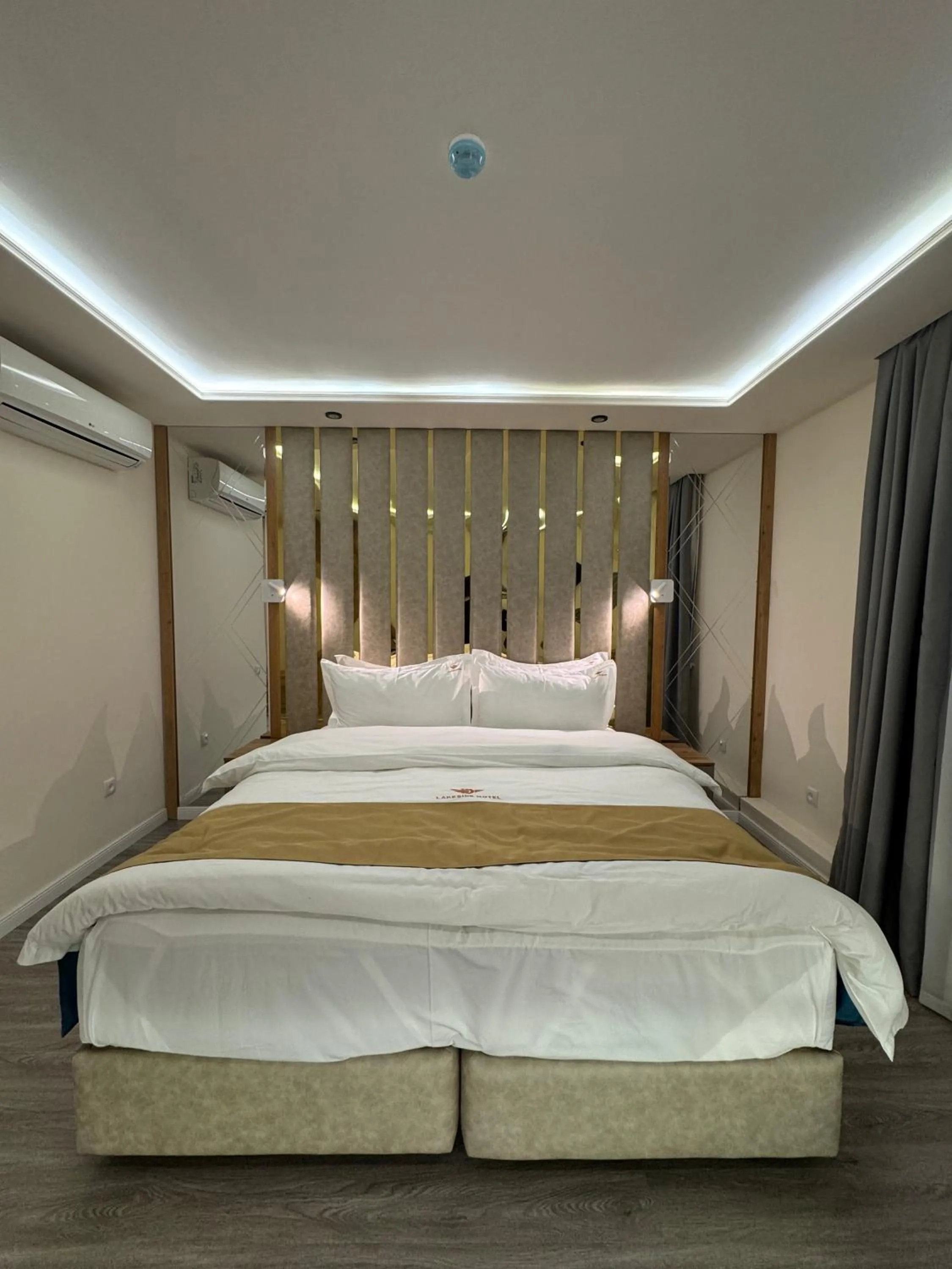 Bed in LakeSide Hotel by EDEN Group