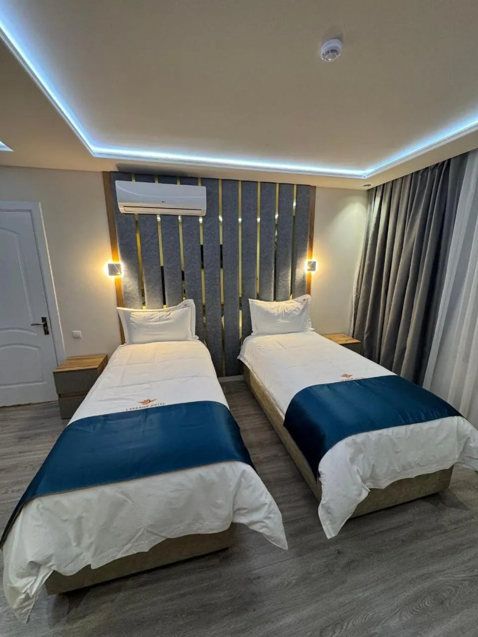 Bed in LakeSide Hotel by EDEN Group