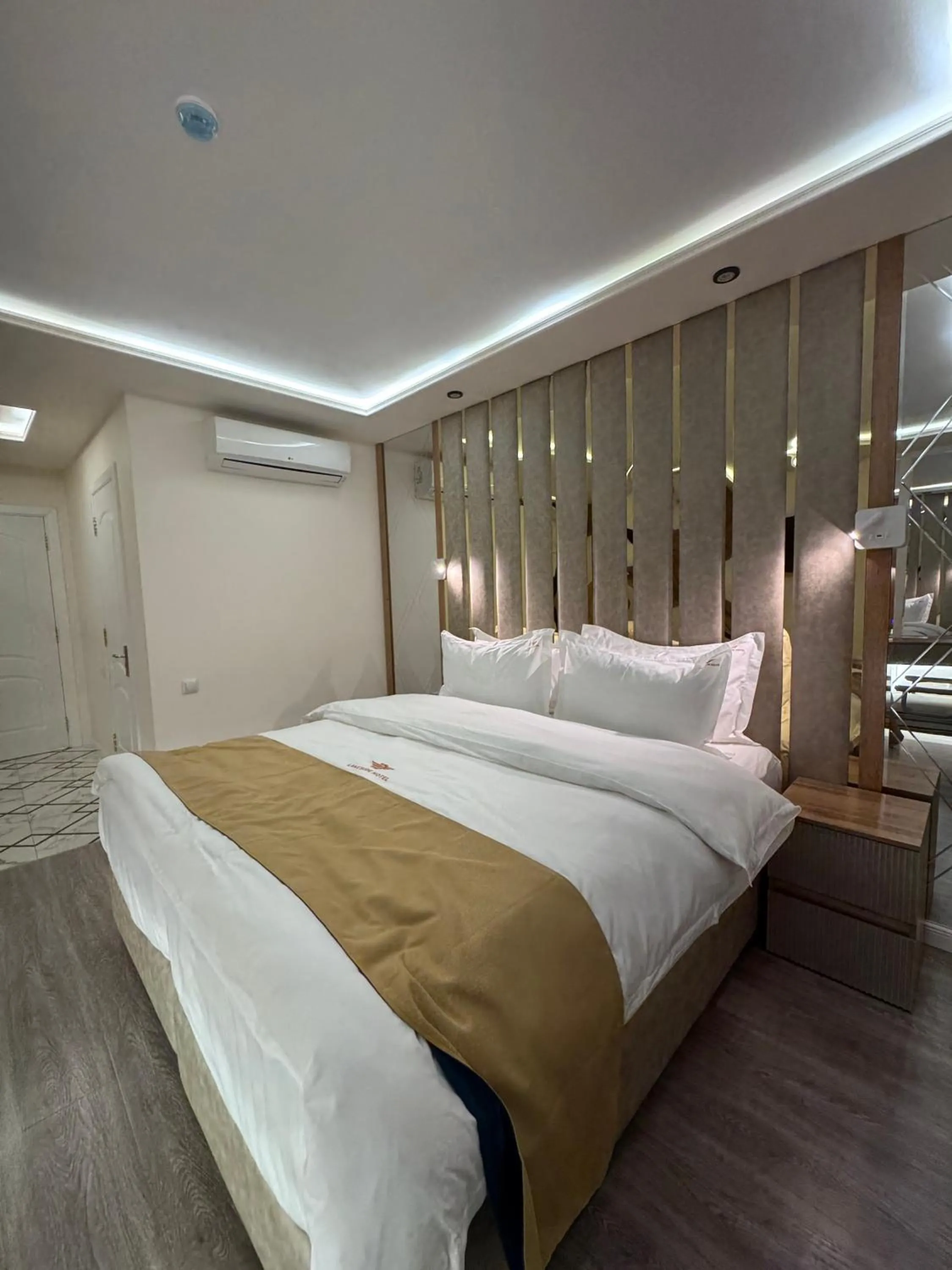 Bed in LakeSide Hotel by EDEN Group