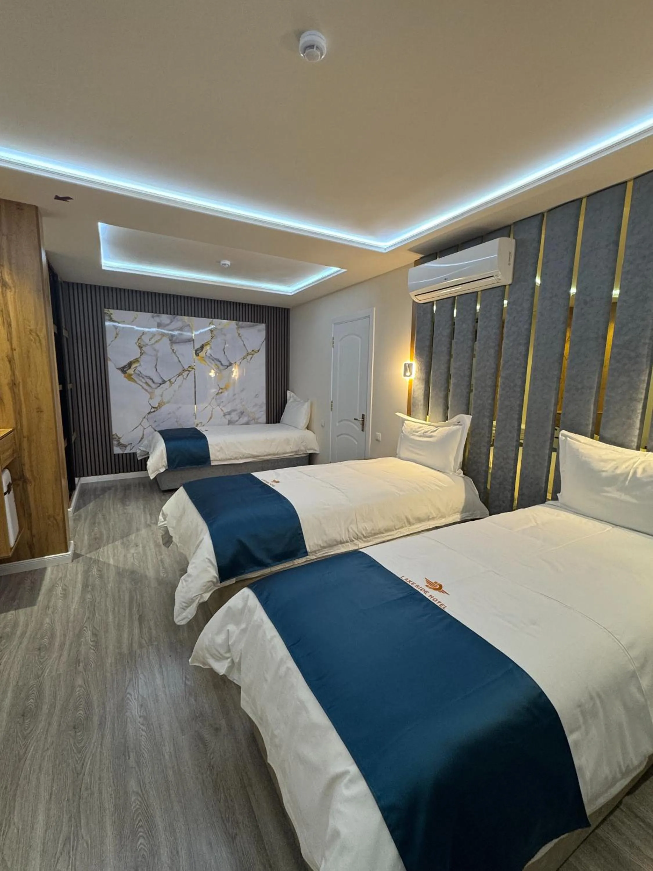 Bed in LakeSide Hotel by EDEN Group