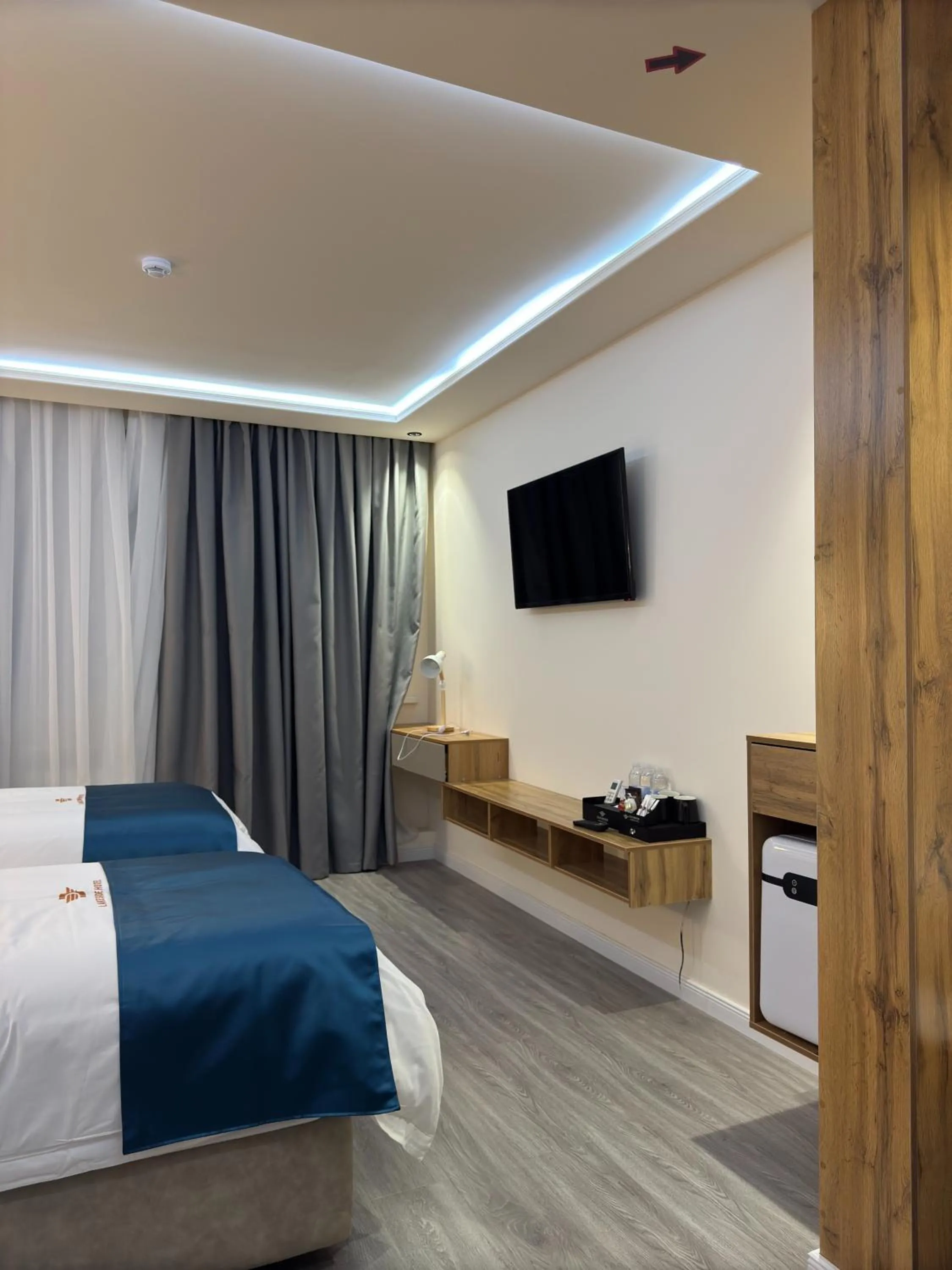 Bed in LakeSide Hotel by EDEN Group
