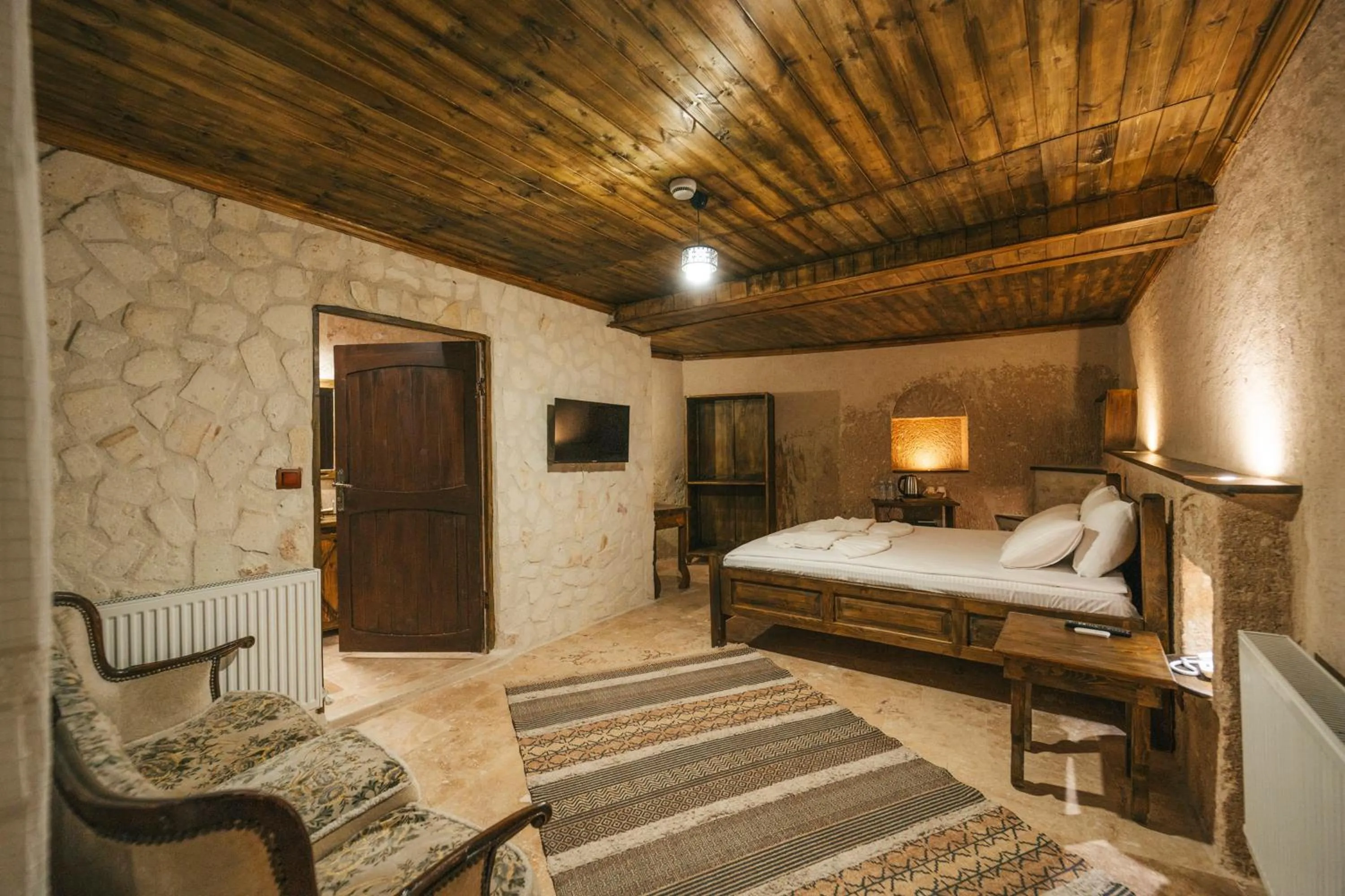 Bed in Cappatria Cave House