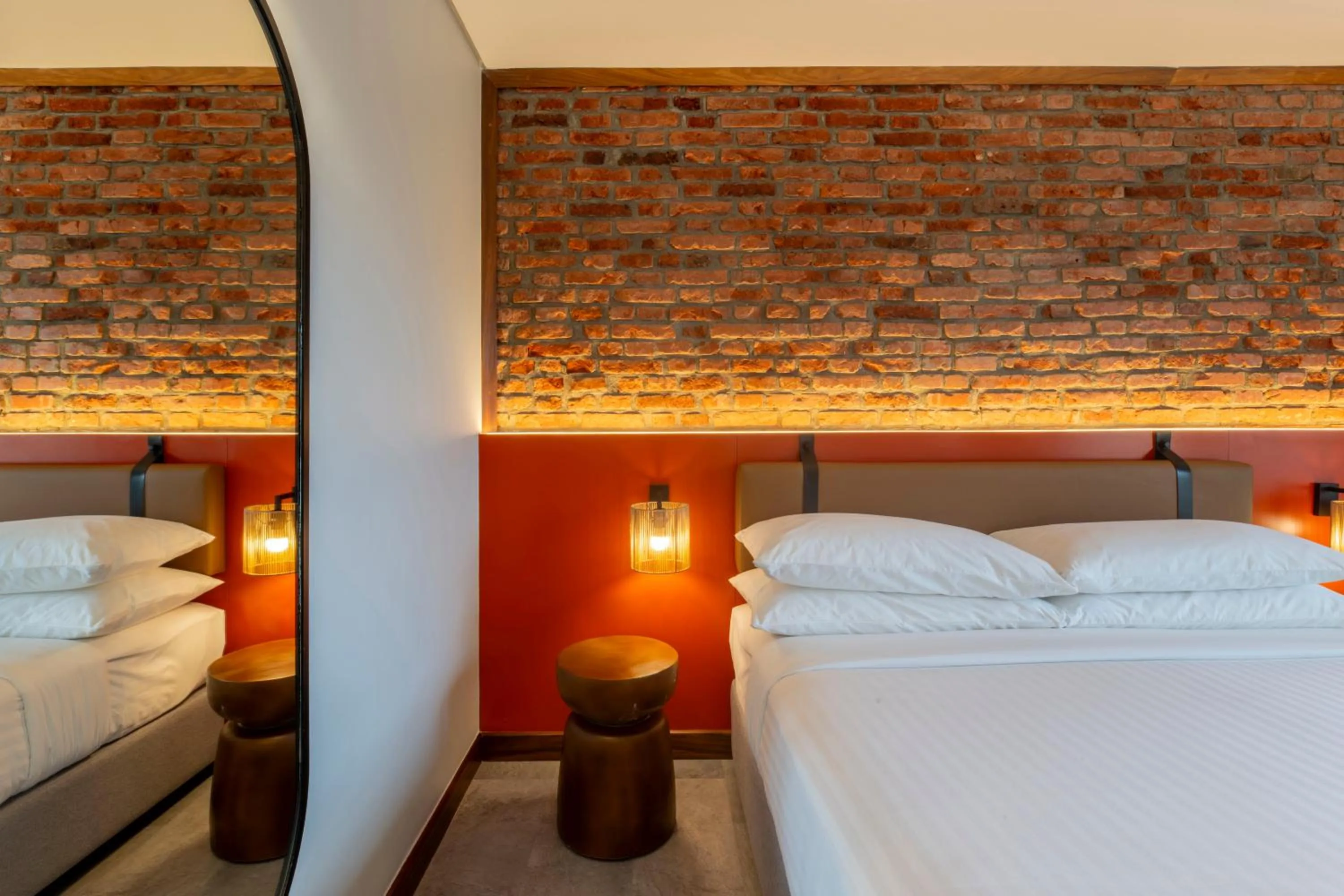 Bed in Zaria Court Kigali, Tapestry Collection by Hilton