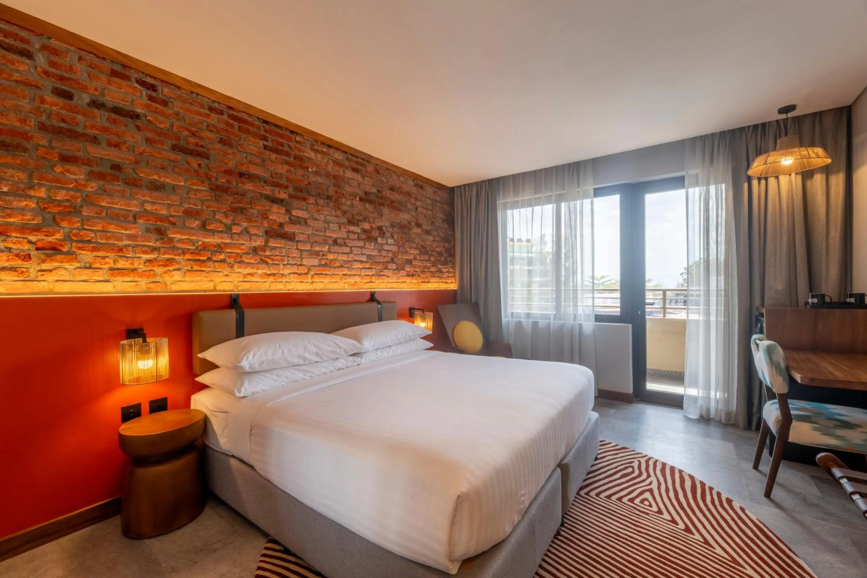 Bed in Zaria Court Kigali, Tapestry Collection by Hilton