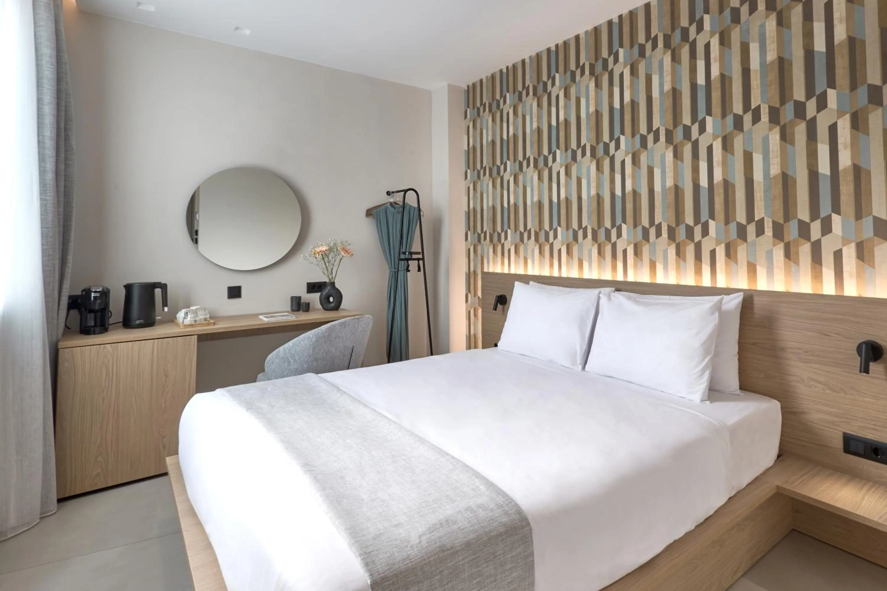 Bed in Athens City Suites