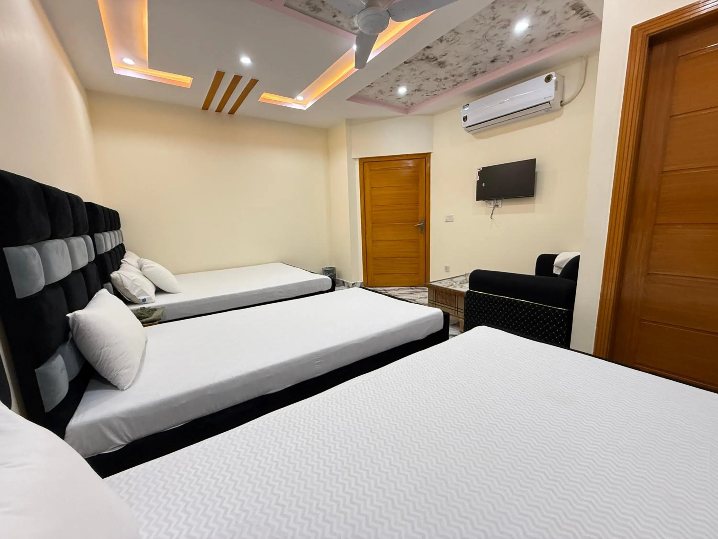 Bed in Serene Elegance Hotel