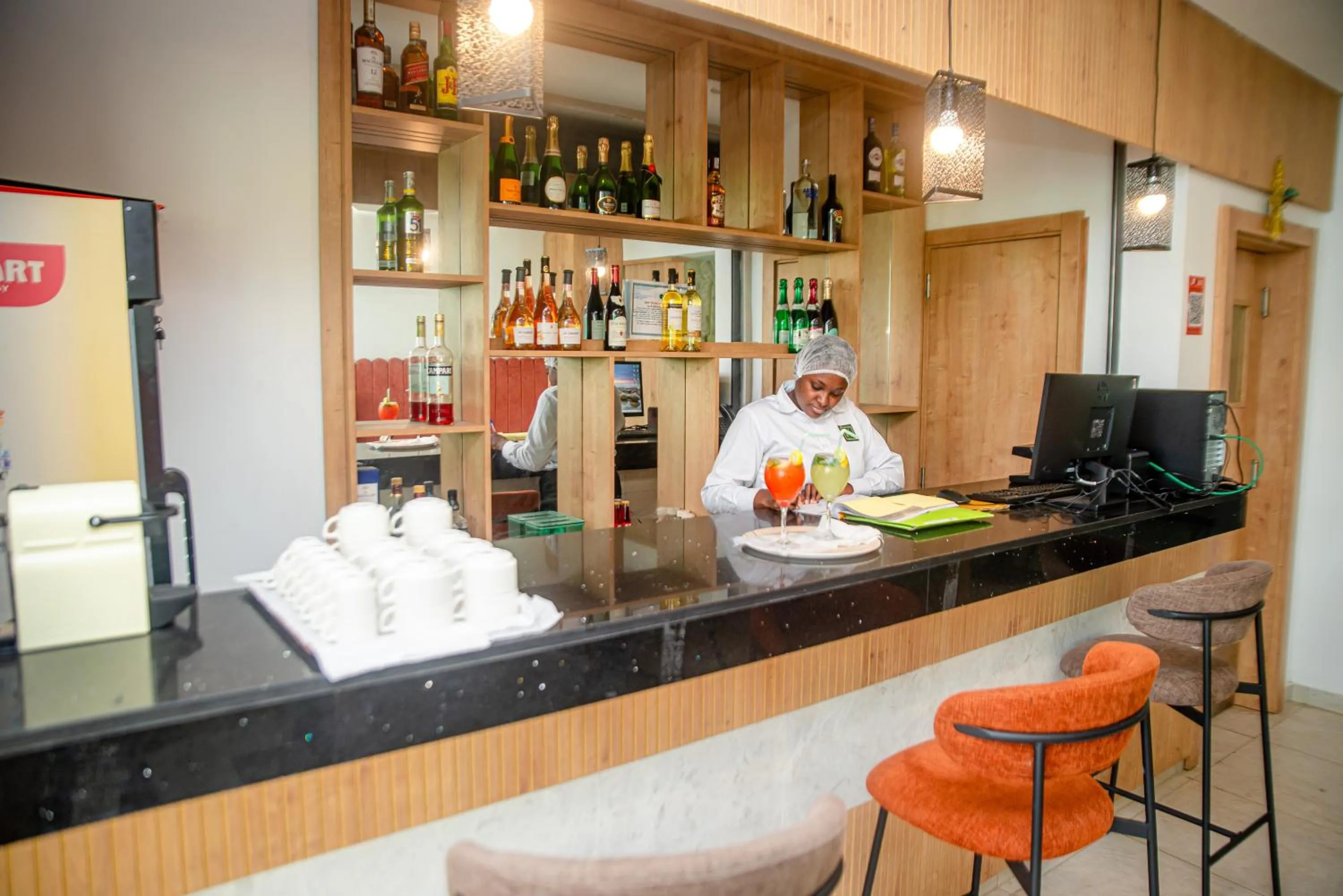 Lounge or bar in Hotel Yatchenin Abidjan