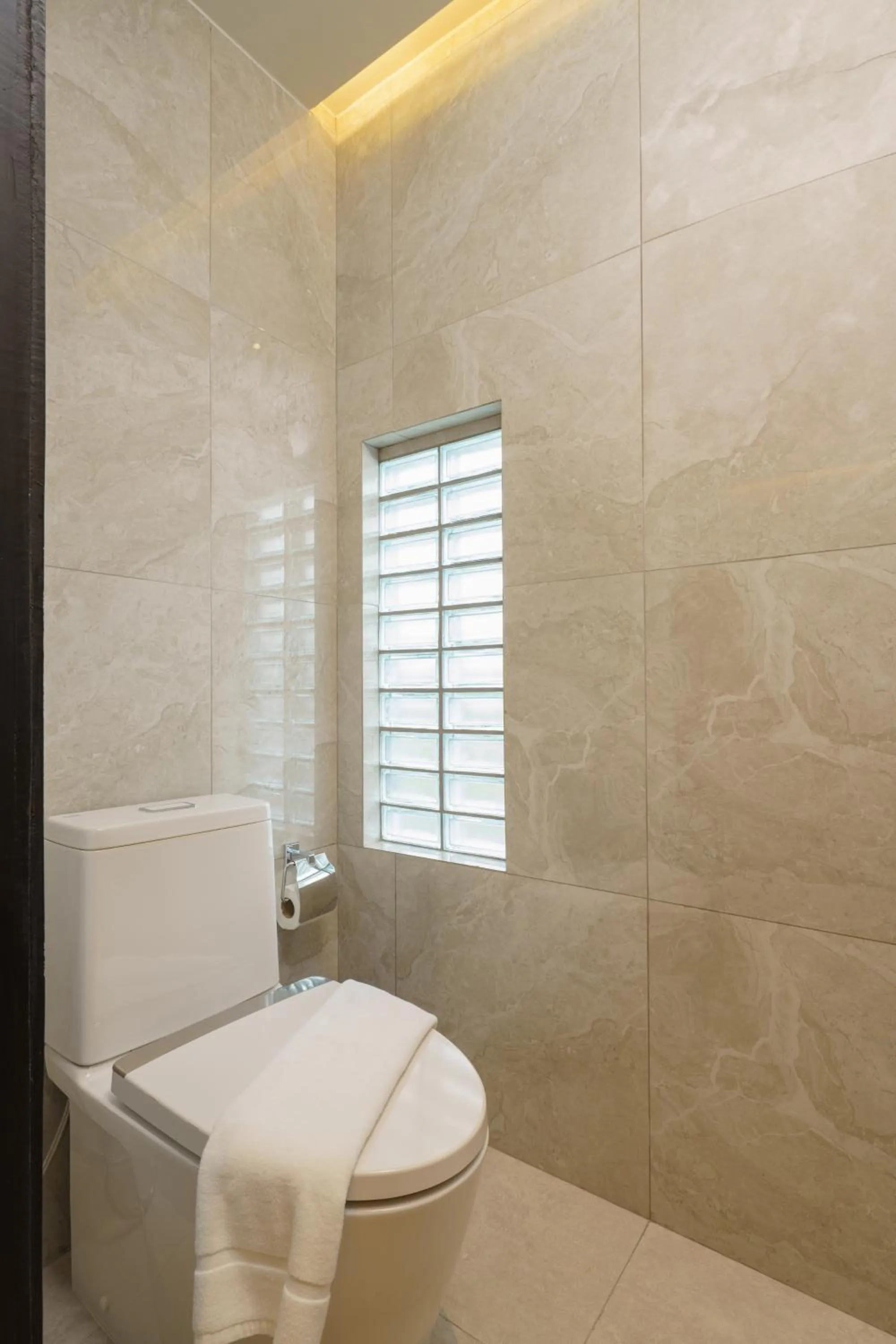 Toilet in Syama Mansion Patong, an Aspira Collection